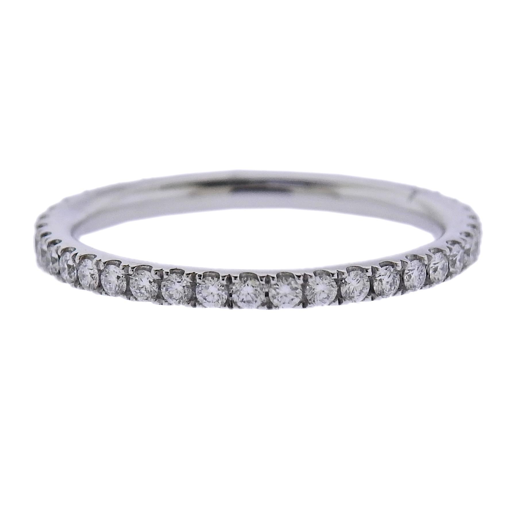 Brand new 18k white gold Aurora wedding band ring by Georg Jensen, with approx. 0.49ctw G/VS diamonds. Model #3572540. Ring is 2mm wide, Available in sizes: 51,53. Marked: GJ, 750, ring size. Weight 2 grams.
