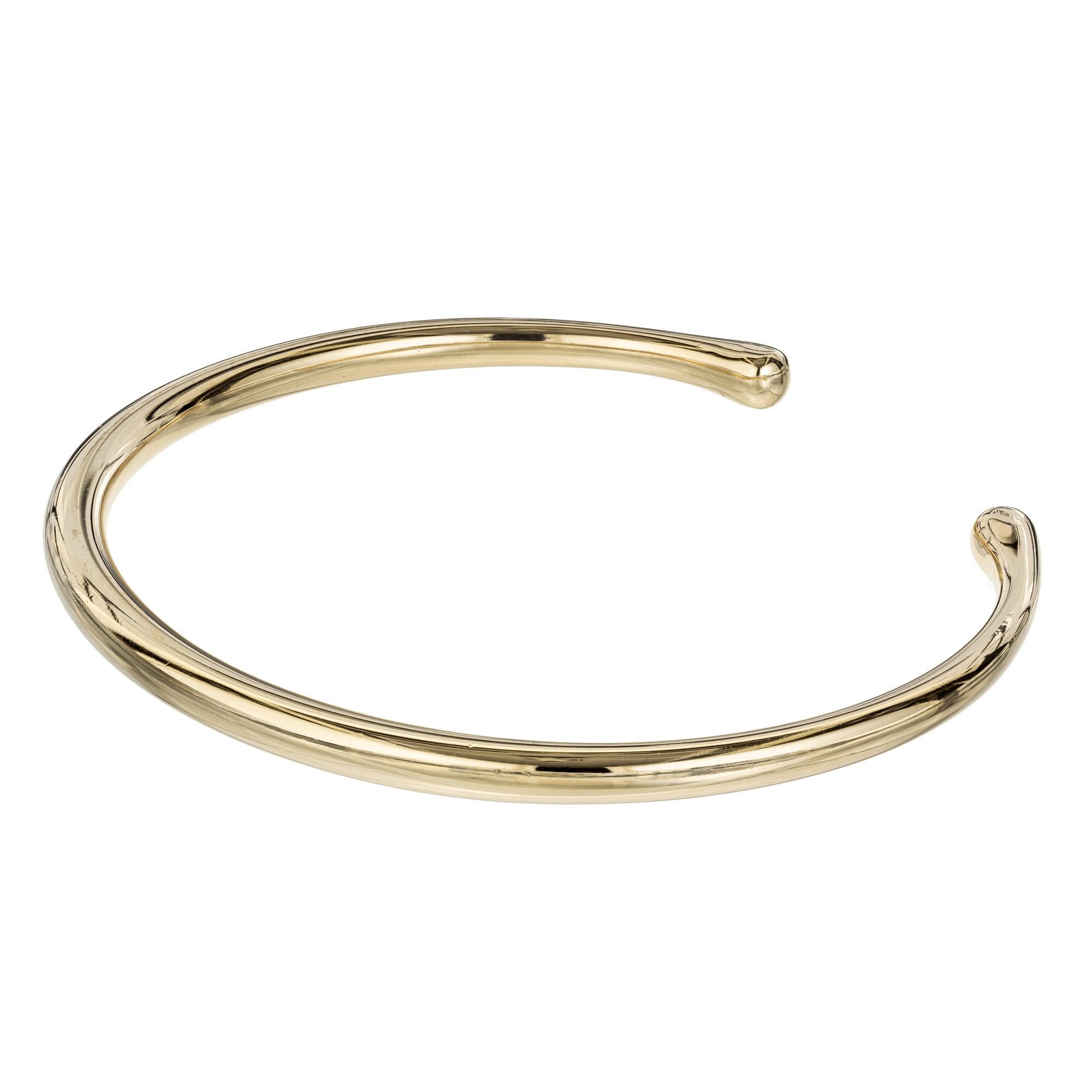 Georg Jensen 18k yellow gold cuff style bracelet that tapers from center to ends. 7 inch. 

18k yellow gold 
Stamped: 18k 750
Hallmark: Georg Jensen
29.2 grams
Width: 4.0mm
Thickness/depth: 4.1mm
Inside dimensions: 2.5 inches x 2.25 inches
Shape: