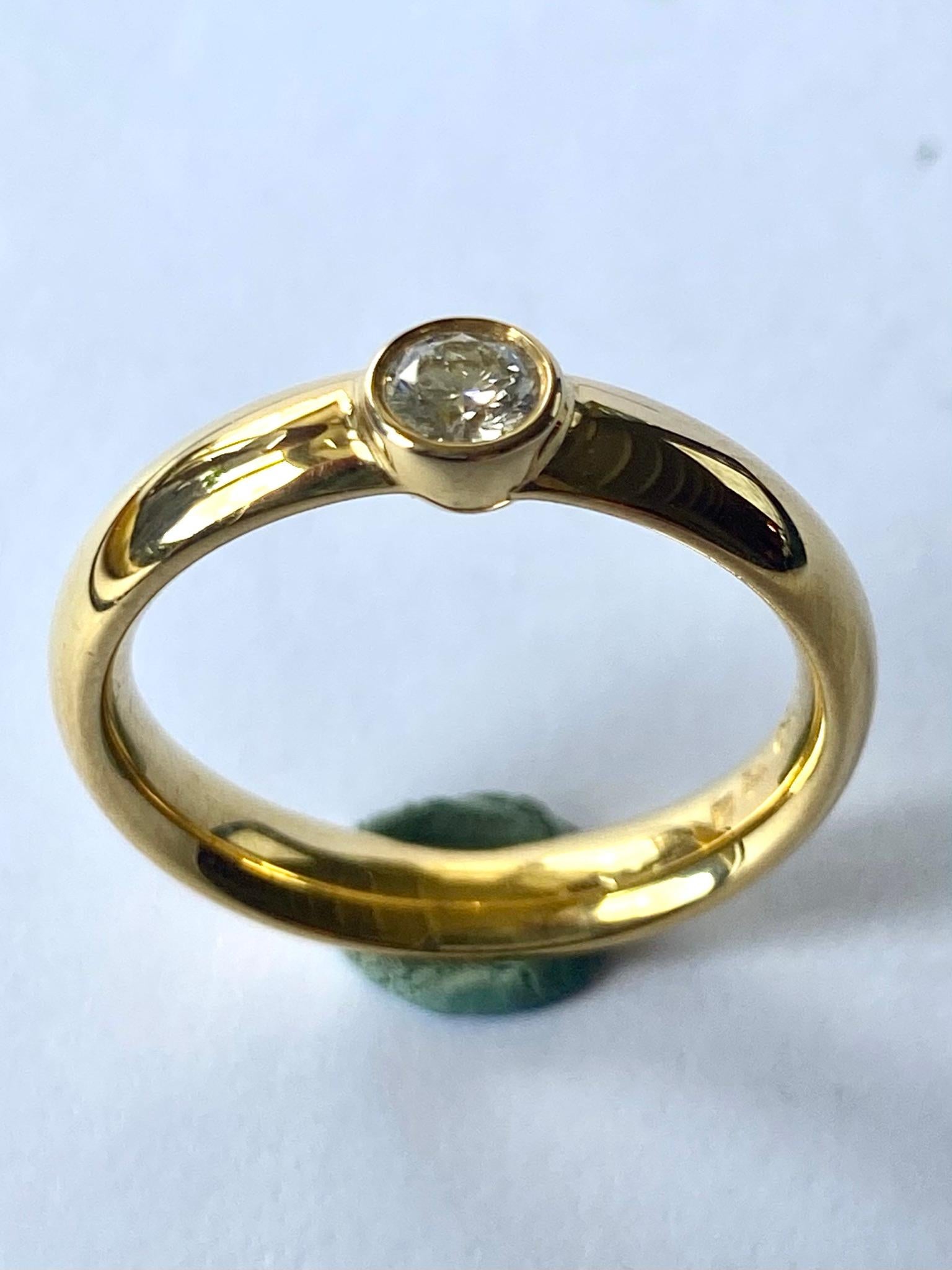 One (1) 18 Karat Yellow Gold Ring Stampoed 750 & Georg Jensen.
Model: Centenary 
Set with one (1) roudn Brillant Cut Natural Diamond  ca 0.23 ct VVS - F
Total Weight Ring   5.97 gram   3.5 mm 
Size: 17.25  (54)  USA: 7-   UK: O-
The Ring will be