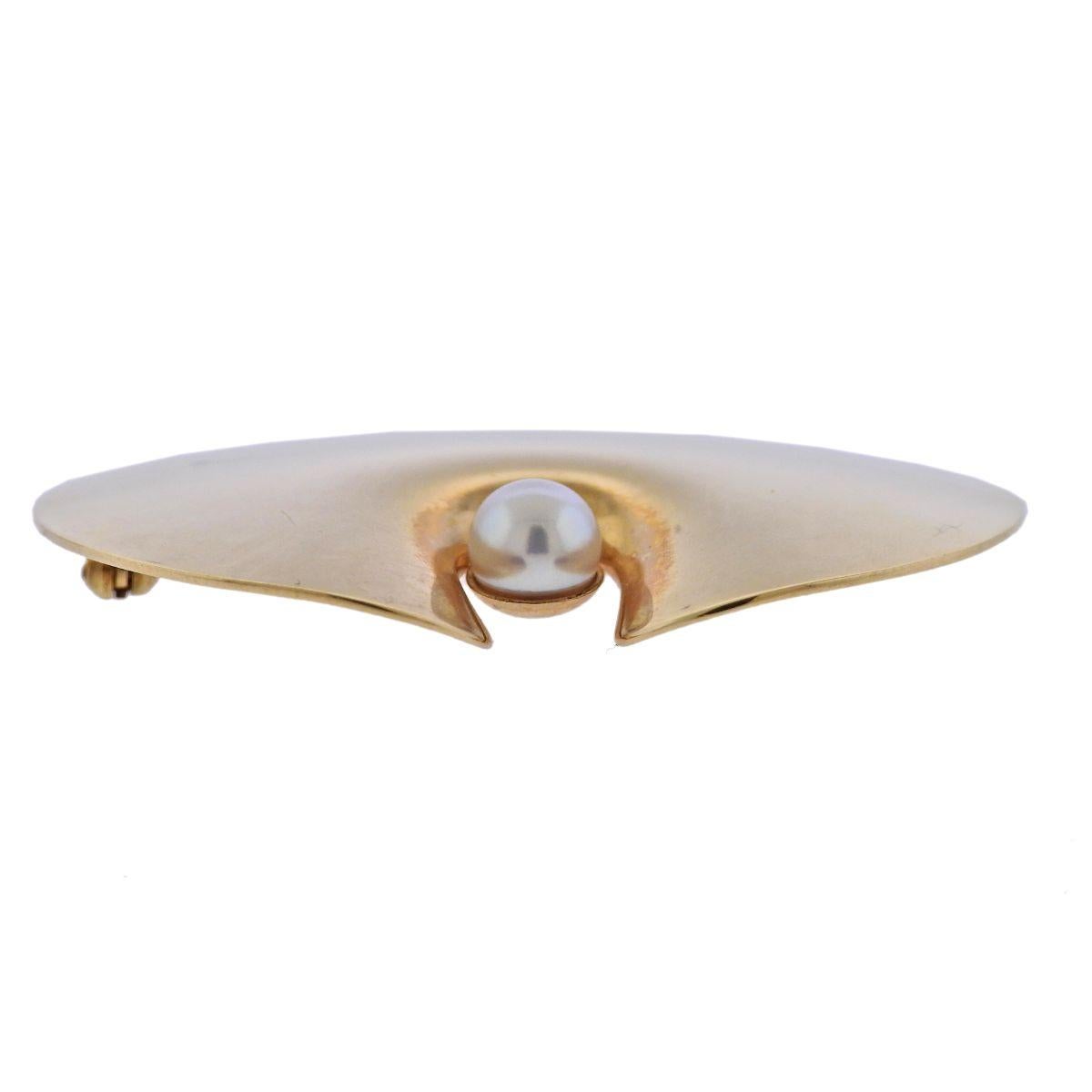 18k yellow gold brooch by Georg Jensen, No. 1351, with 6.3mm pearl. Brooch is 40mm x 45mm. Weight - 14.6 grams. Marked: Georg Jensen mark, 750, 1351. 