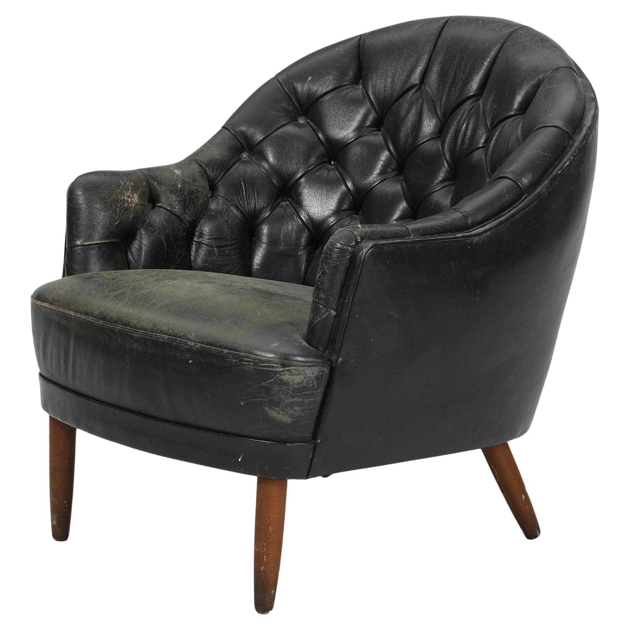 Georg Kofoed zugeschriebener dänischer Loungesessel aus getuftetem dunkelgrauem Leder aus den 1940er Jahren
