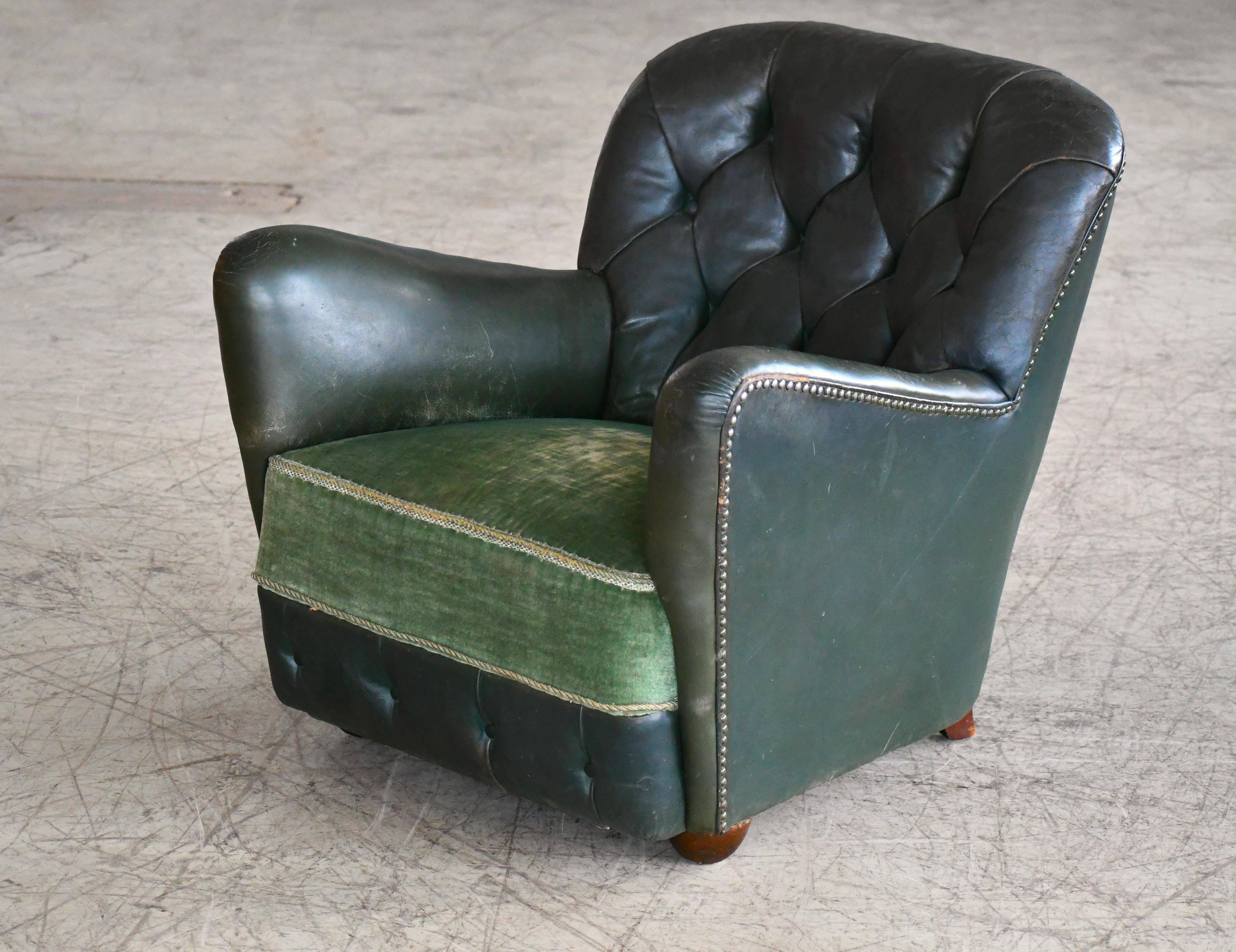Very cool and rare 1940s lounge chair attributed to Master Furniture Maker Georg Kofoed of Copenhagen with the design attributed to Flemming Lassen. The stance and the overall design lines are very reminiscent of Lassen's iconic designs and the
