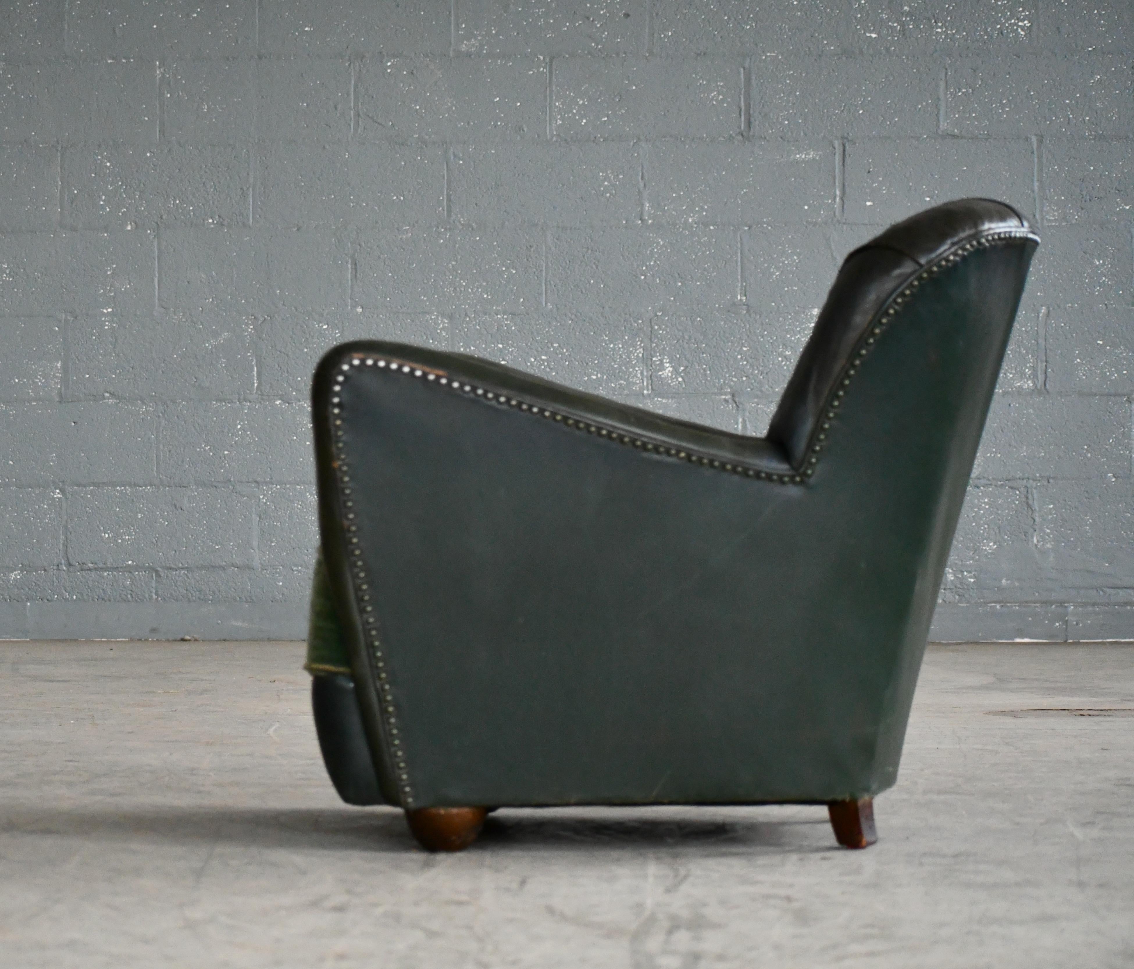 Mid-20th Century Georg Kofoed Attributed Danish 1940s Lounge Chair in Tufted Dark Green Leather