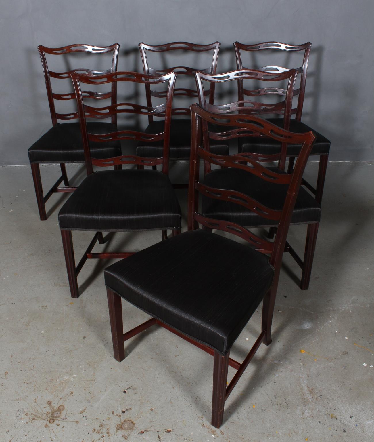 Georg Kofoed set of dining chairs.

Seat upholstered with horsehair.

Legs of mahogany.

Made by Georg Kofoed in the 1930s.