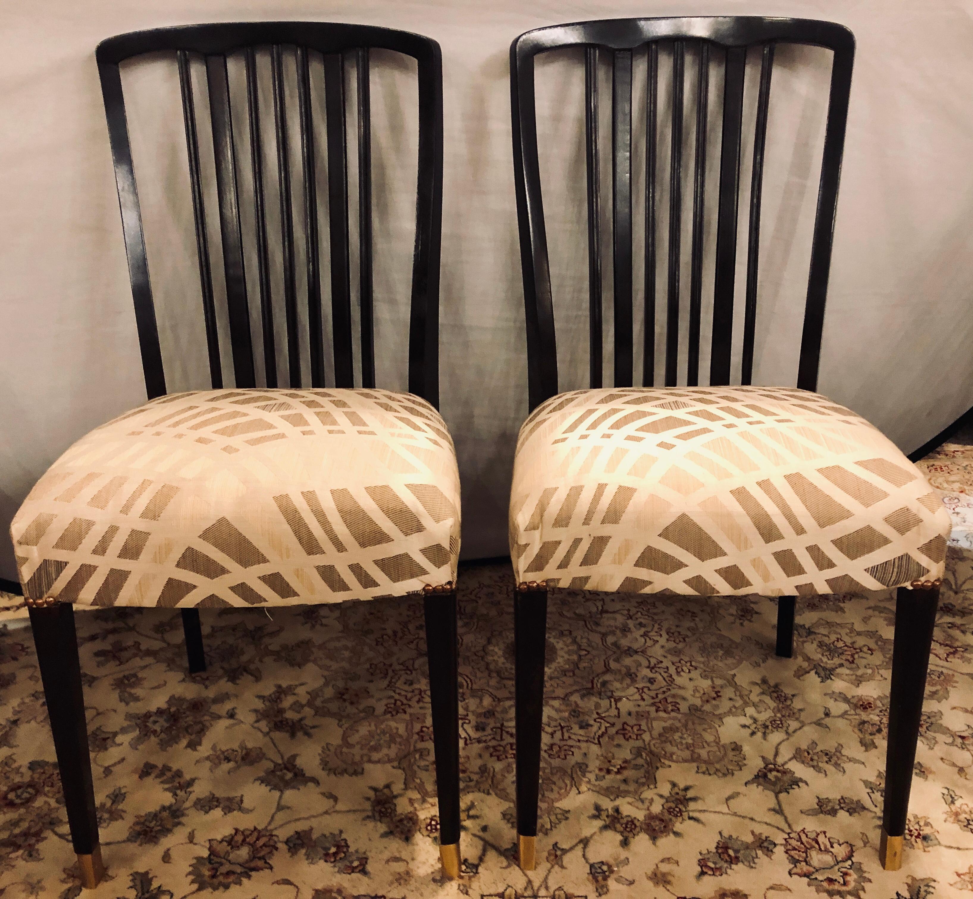 Set of 24 Georg Kofoed Scandinavian Modern ebony or rosewood dining chairs. Can purchase as many as are needed from this long and hard to find set of twenty-four. Mid-Century Modern at its peck. This fully hand rubbed French polished and newly