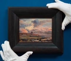 Küstenlandschaft mit dramatischen Wolken