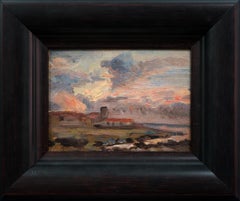 Küstenlandschaft mit dramatischen Wolken