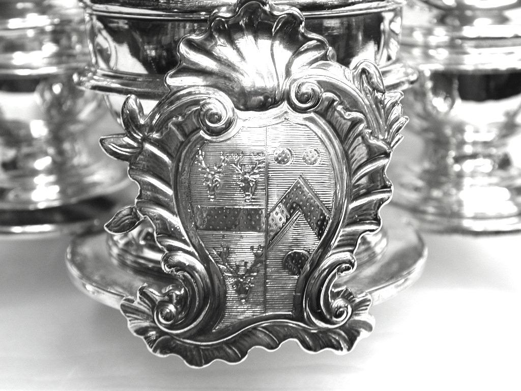 George 11 silver and glass 'Warwick' cruet.
This style of cruet was first made especially for the Duke of Warwick by Anthony Nelme in 1715, hence the name.
Sam Wood was a renouned maker of silver casters and this style of framed cruet,
The main