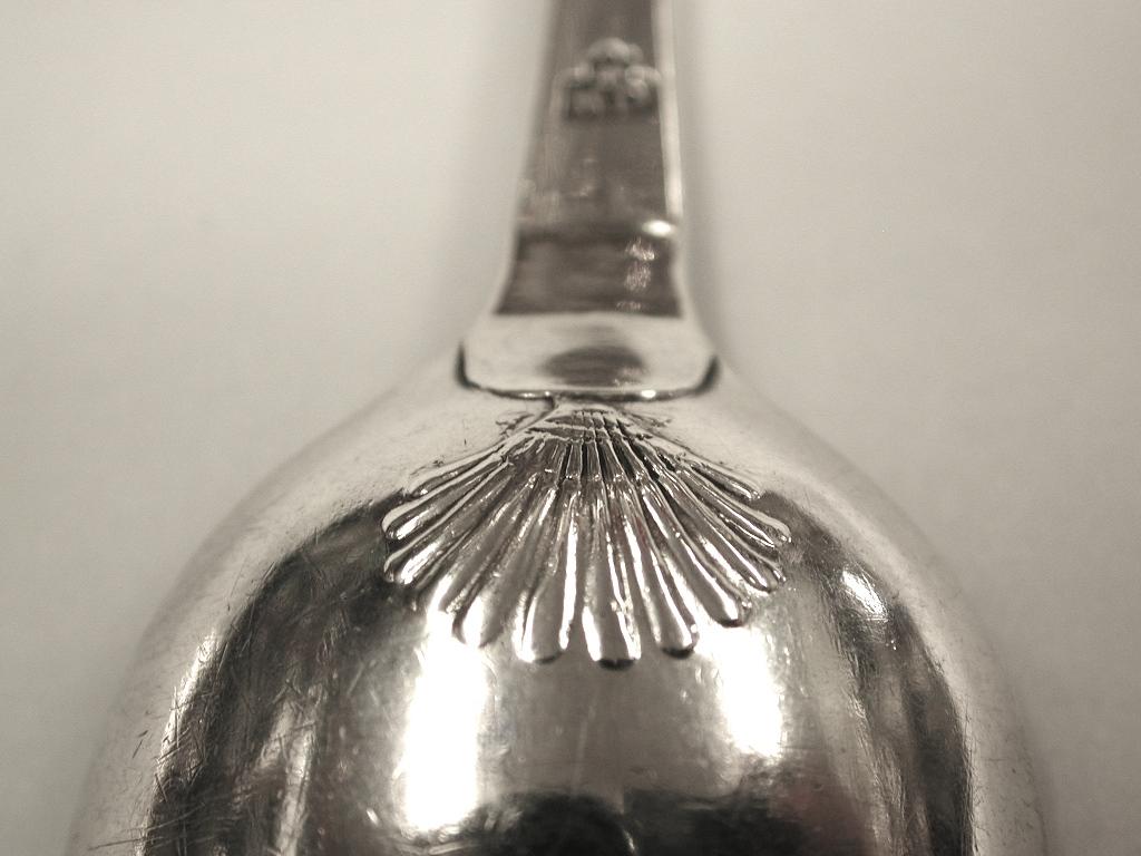 George 11 silver shell back table spoon, Marmaduke Dainty, London, 1738
Heavy gauge of silver, with a well-defined shell motif which were popular in the this period
Probably given as a marriage spoon in 1739,as there are two lots of initials and a