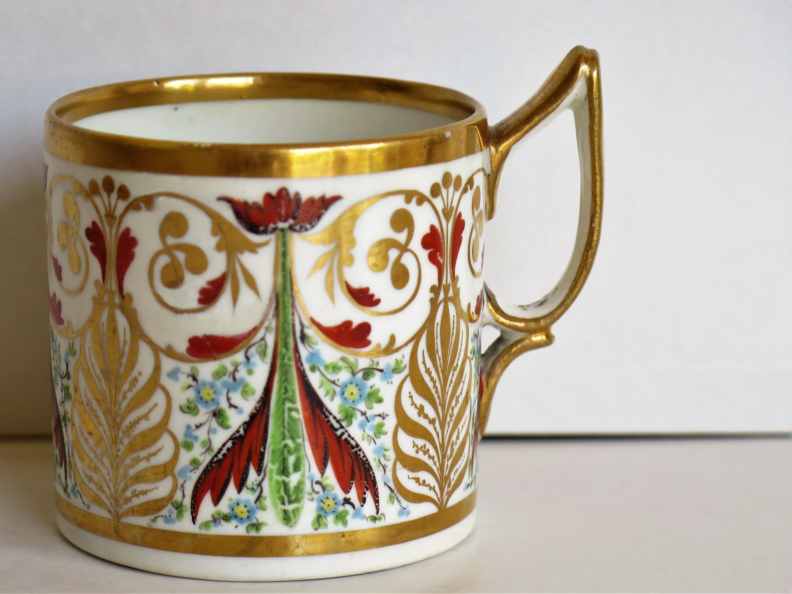 This is a highly collectable, hand-painted porcelain coffee can (cup) , made by Derby porcelain Co., England in the George III period, circa 1810.

The coffee can is straight sided and nominally 2.5 inches square excluding the handle. The handle is