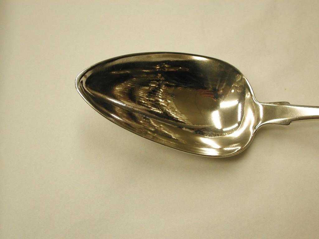 Antique irish silver stuffing spoon, dated 1811, made in Dublin by James Scott.
  