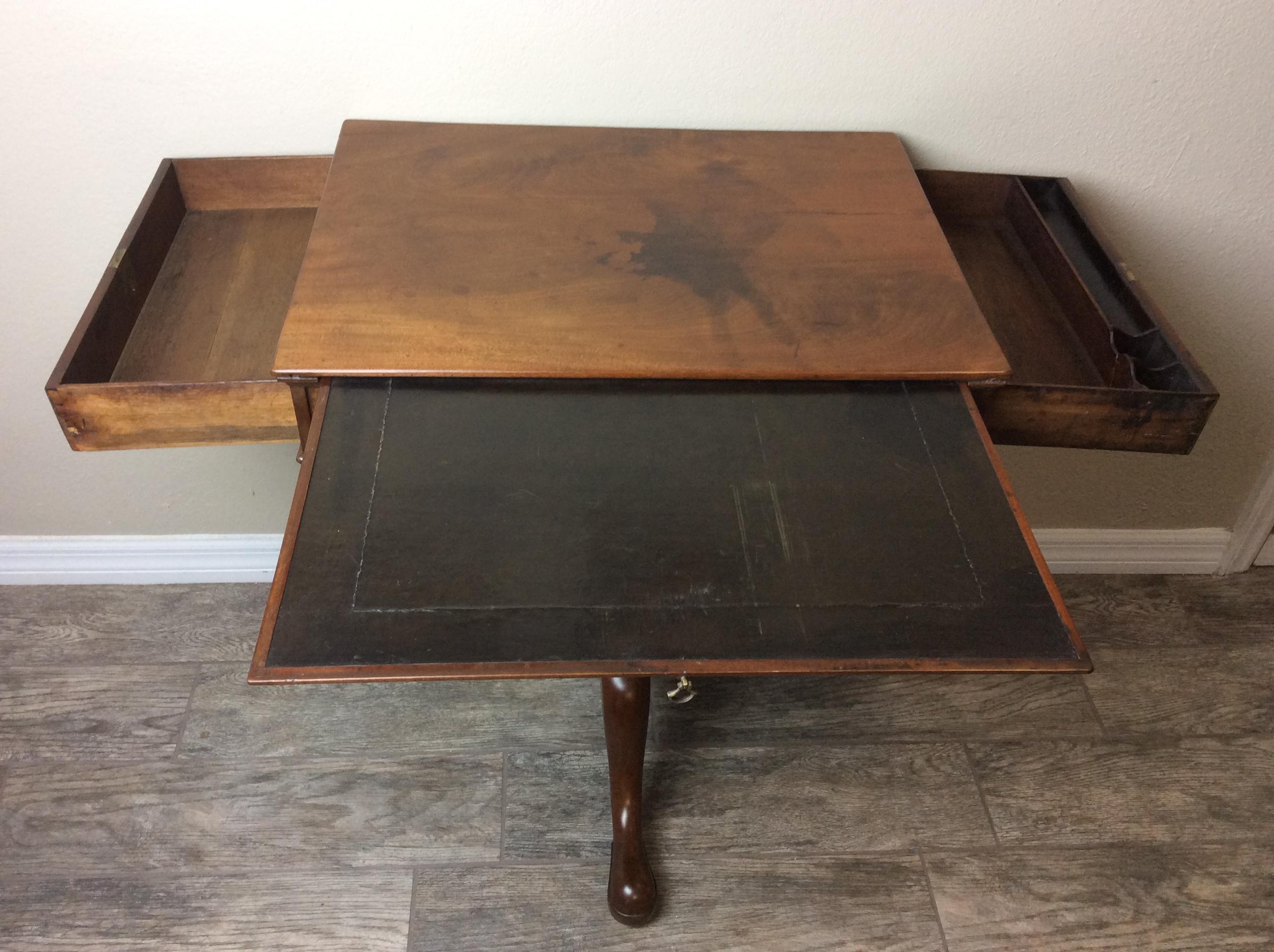An excellent early Georgian Mahogany Writing / Work Table dating around 1780-1800. A fine example of a Writing Table of this period in very good condition. There is a drawer on either end, one encompassing an ink well and quill pen divided area.