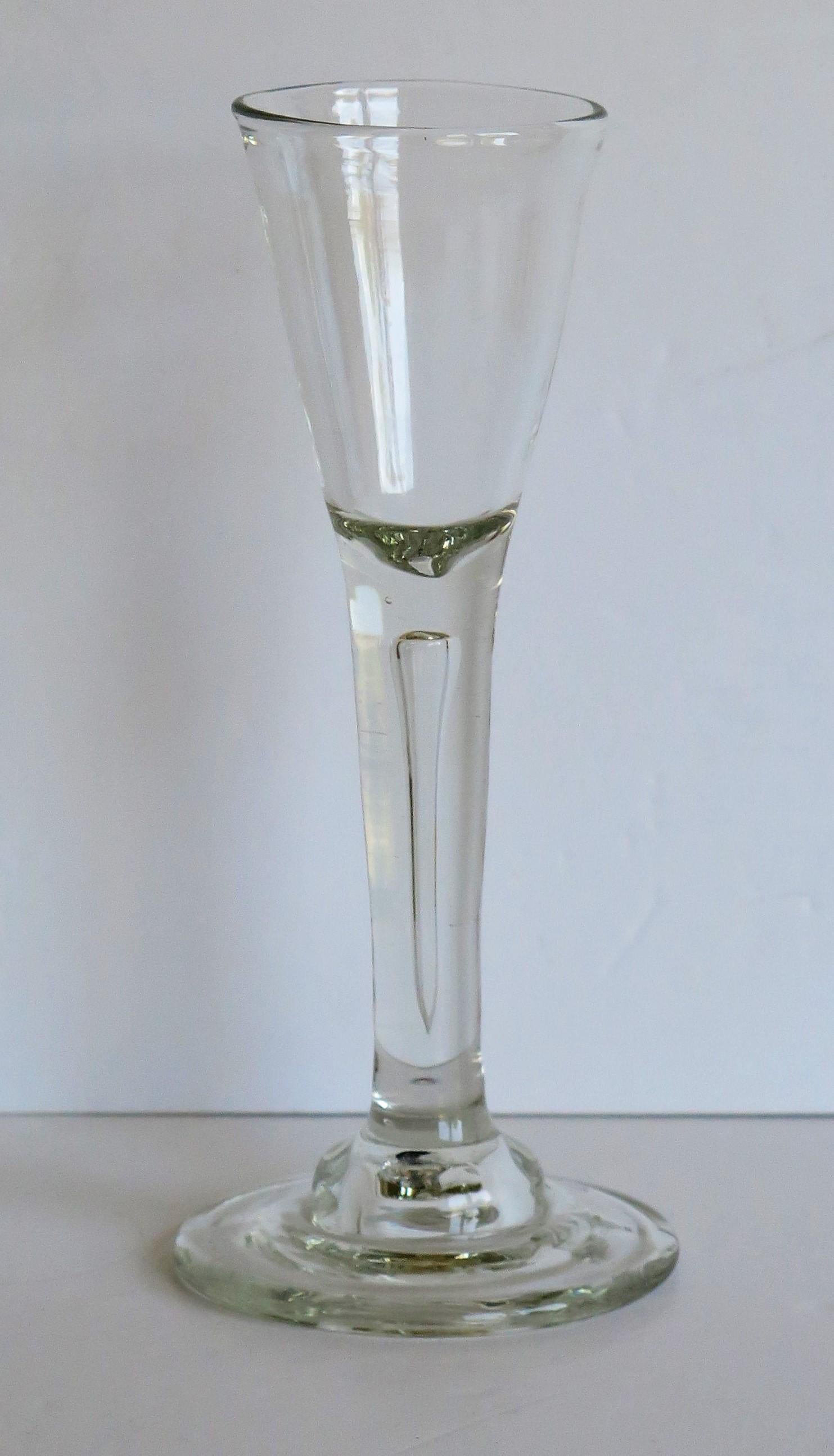 glass with a foot and stem