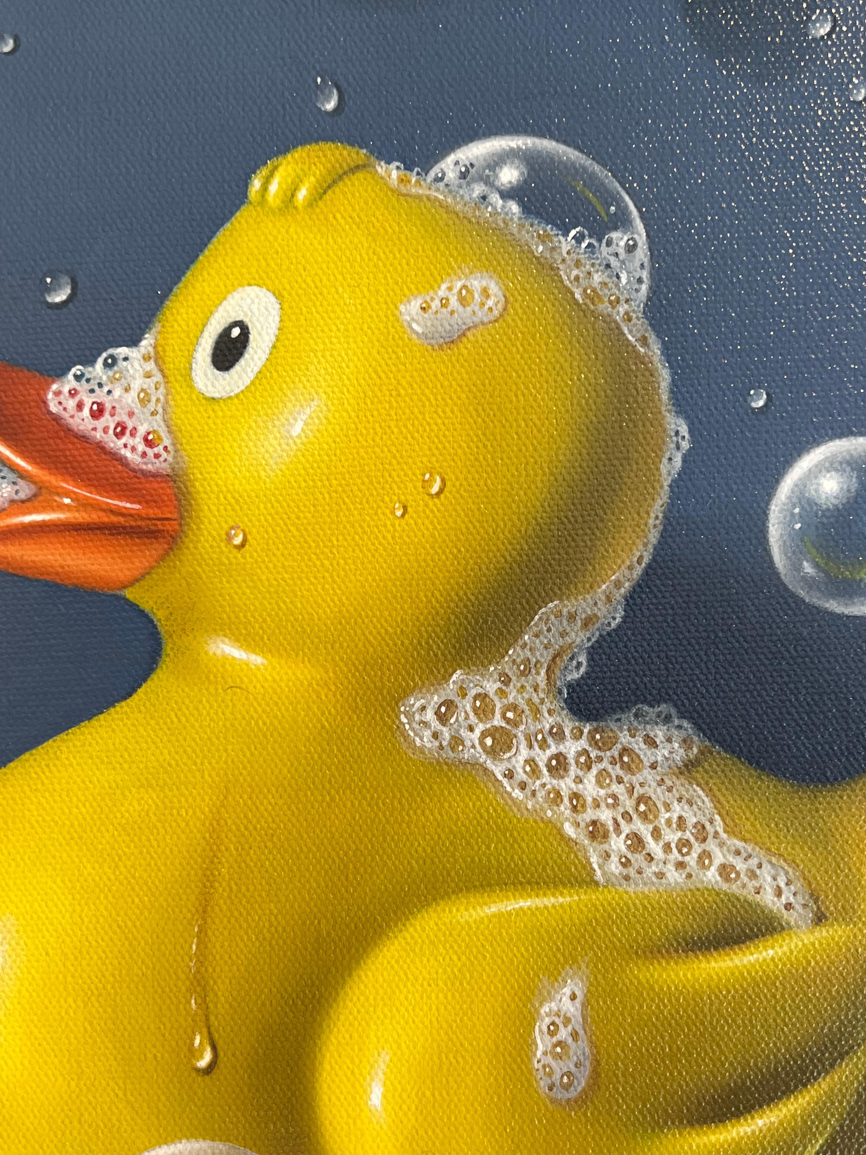 In George A. Gonzalez’s “Rubber Ducky,” the viewer is transported into the intimate confines of a bathroom, where a familiar childhood toy takes center stage. The yellow rubber ducky rests upon a small shelf protruding from a ceramic wall, instantly