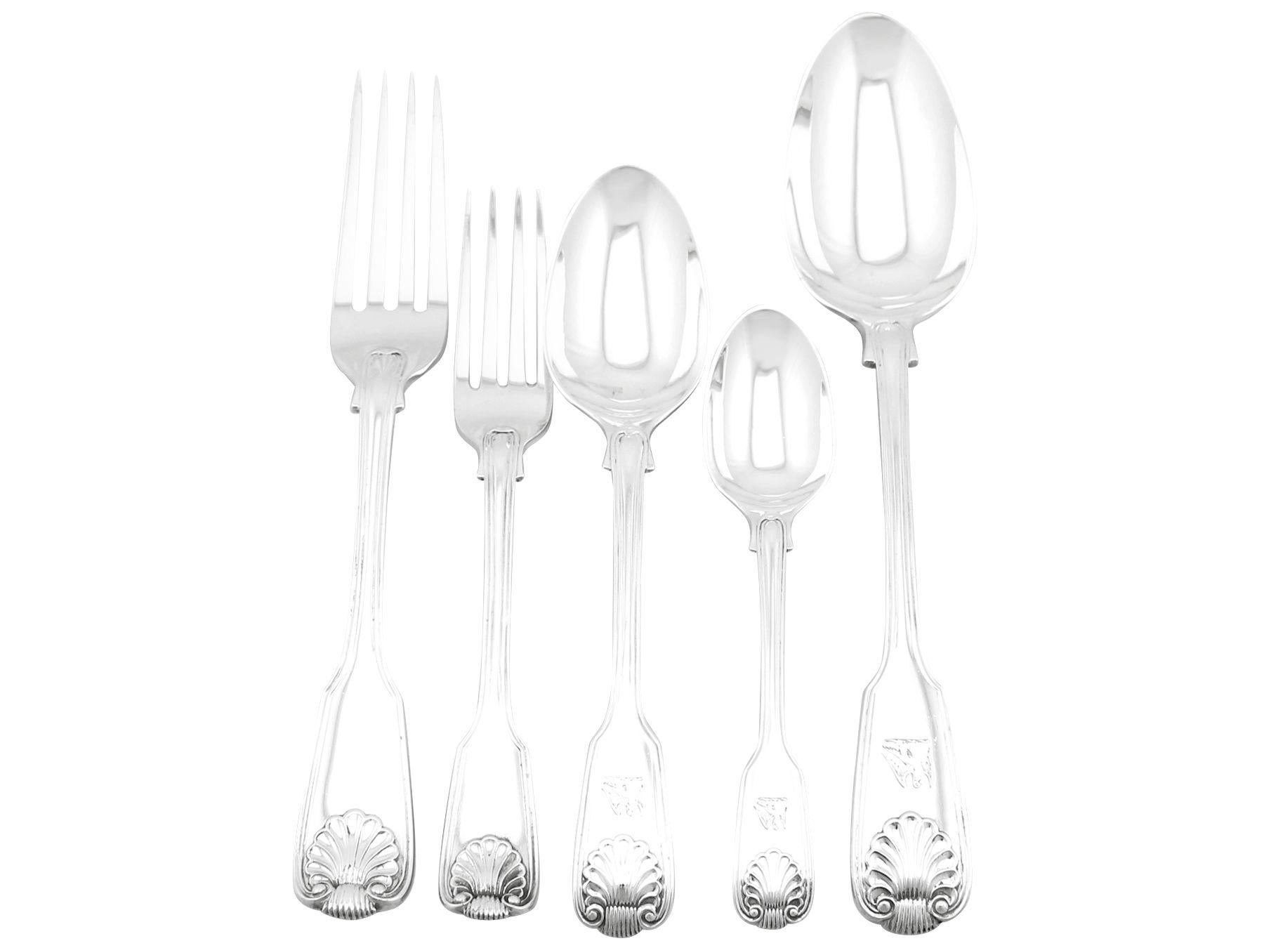 An exceptional, fine and impressive antique English sterling silver straight fiddle, thread and shell pattern flatware service for six persons made by George Adams; an addition to our flatware collection.

The pieces of this exceptional, antique