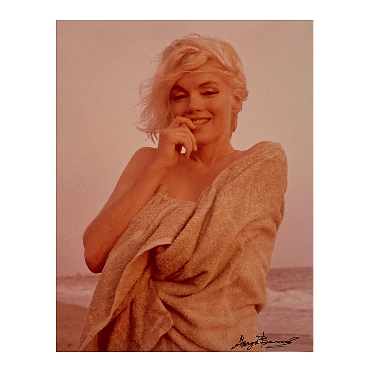 This captivating chromogenic print of Marilyn wrapped in a towel was personally produced and signed by George Barris in 1987. It measures 13-1/2 x 10-1/4 inches (34.3 x 26.0cm) and features the artist's signature in ink recto. It is editioned 'A.P'