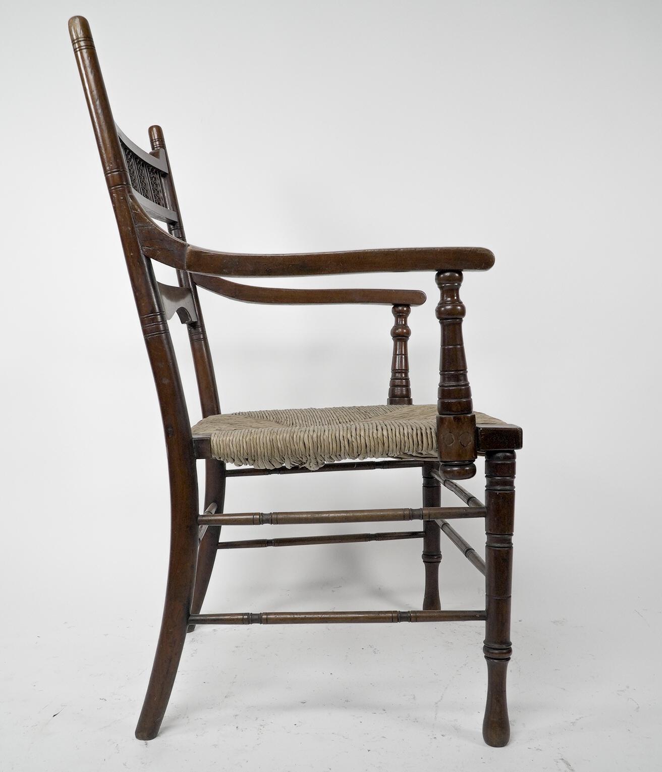 George Bell & George Freeth Roper Aesthetic Movement Walnut rush seat armchair. In Good Condition For Sale In London, GB