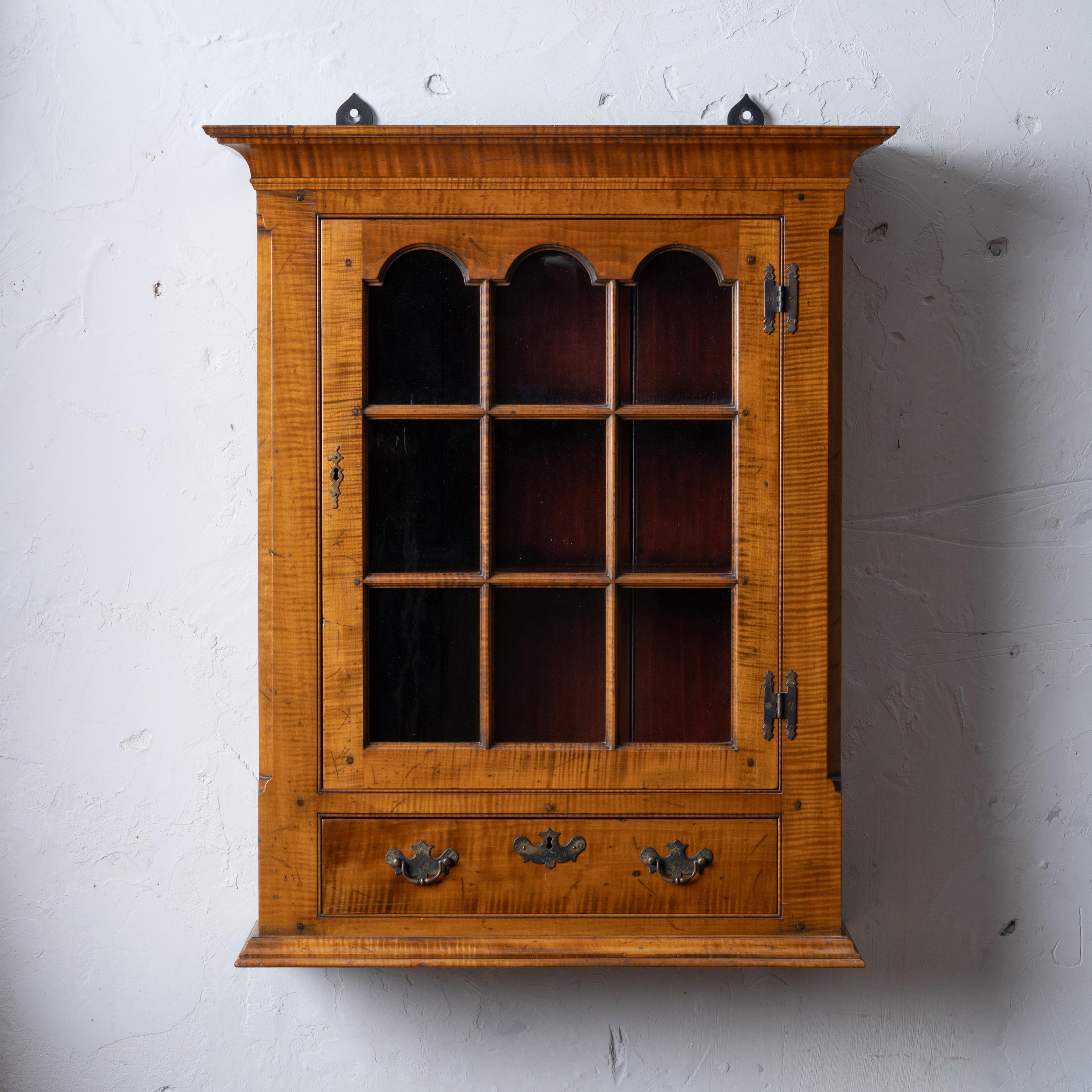 George Beshore

(Missouri/Pennsylvania, 1925-2021)

A benchmade curly maple hanging cupboard in the manner of Chippendale, 1992.

Drawer inscribed “made by G. Beshore, 11/92”.

26 ¾ inches wide by 10 ¼ inches deep by 32 ½ inches tall

