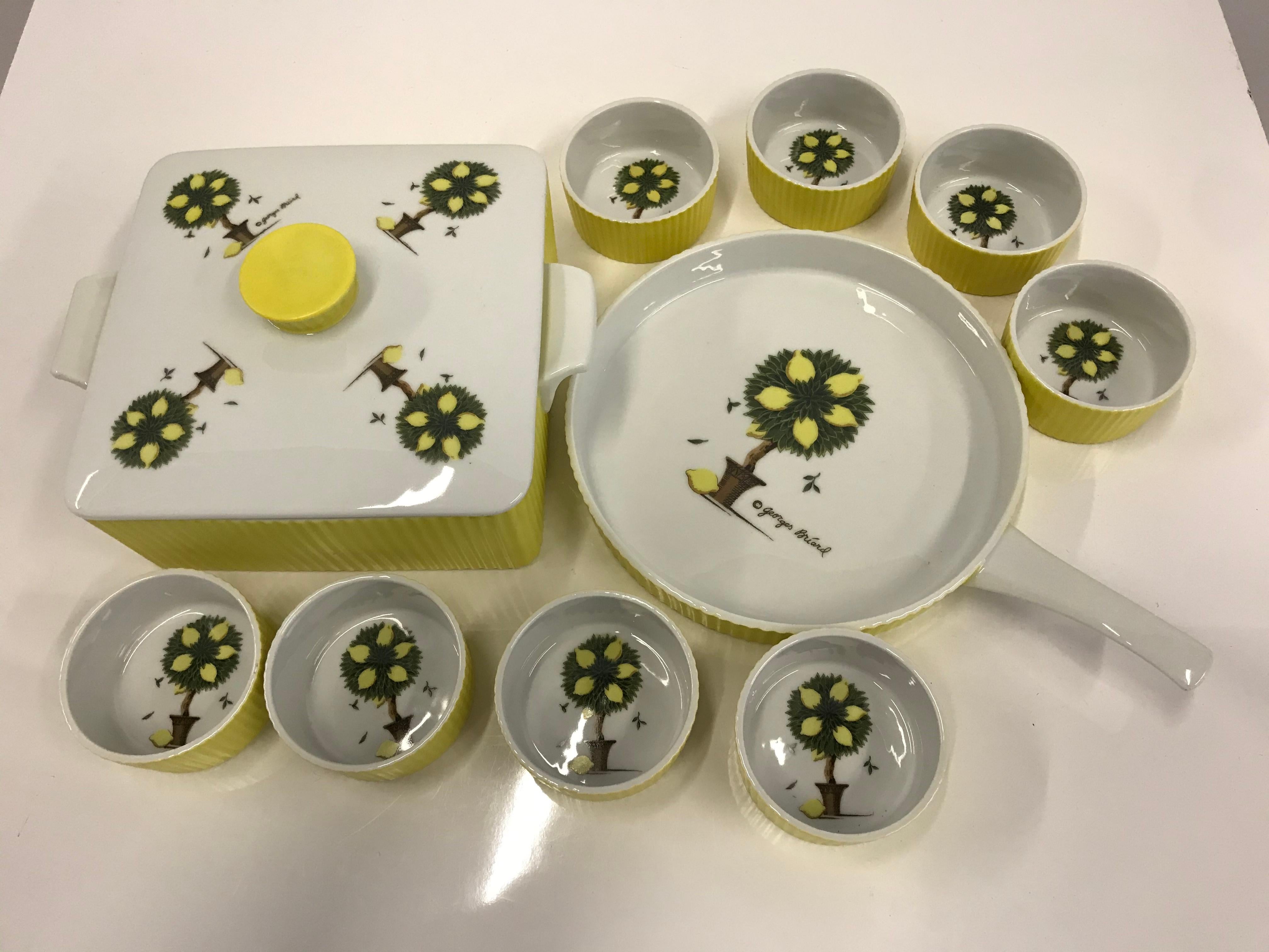 George Briard Mid-Century Modern oven to table serving dishes. In the elegant and fun lemon tree decoration, this set consists of a square covered bowl perhaps for vegetables or casserole, a pan for Quiche and 8 Ramekins perfect for Crème Brulee.