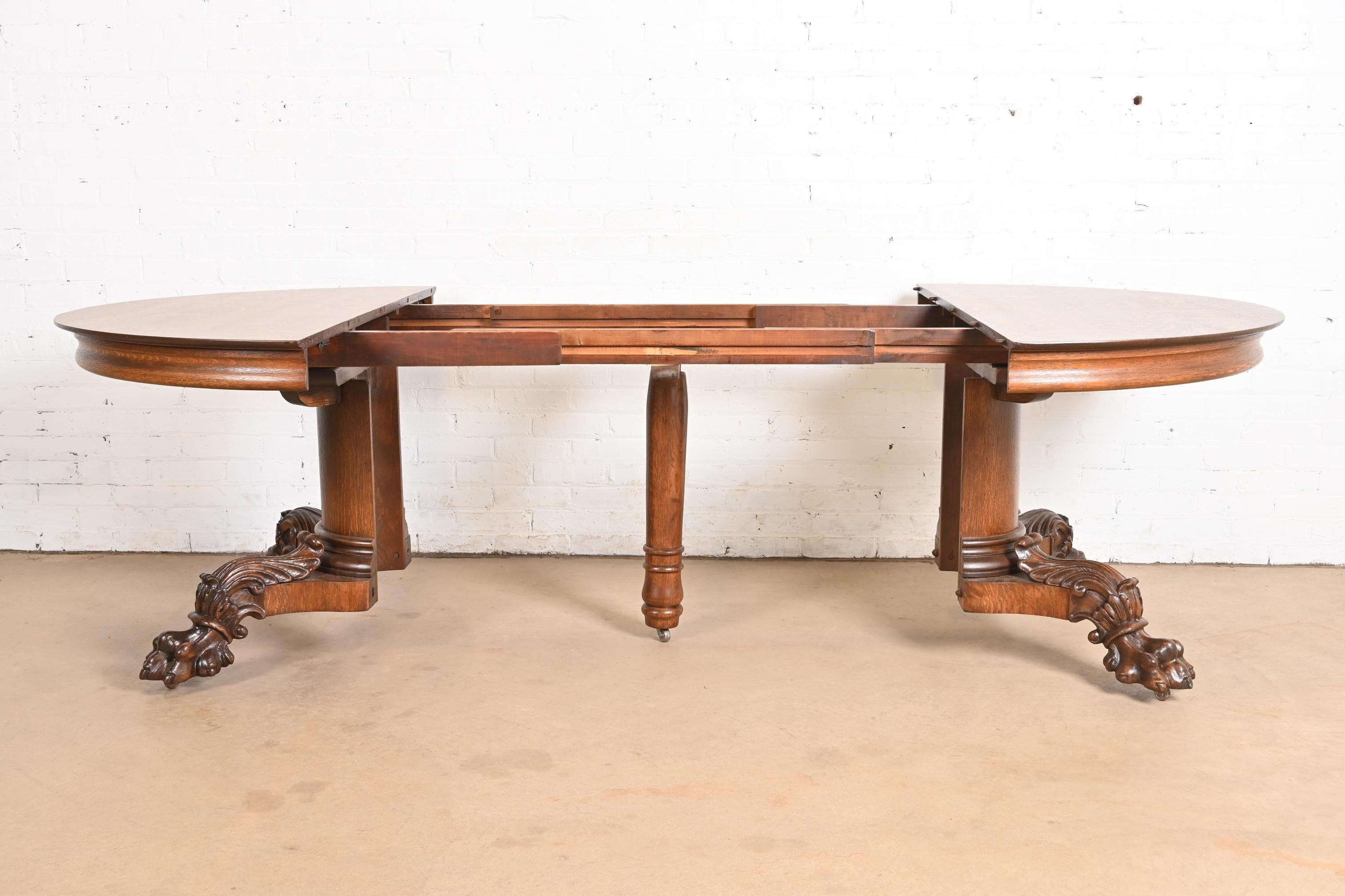 George C. Flint Co. Antique Victorian Oak Split Pedestal Extension Dining Table For Sale 2