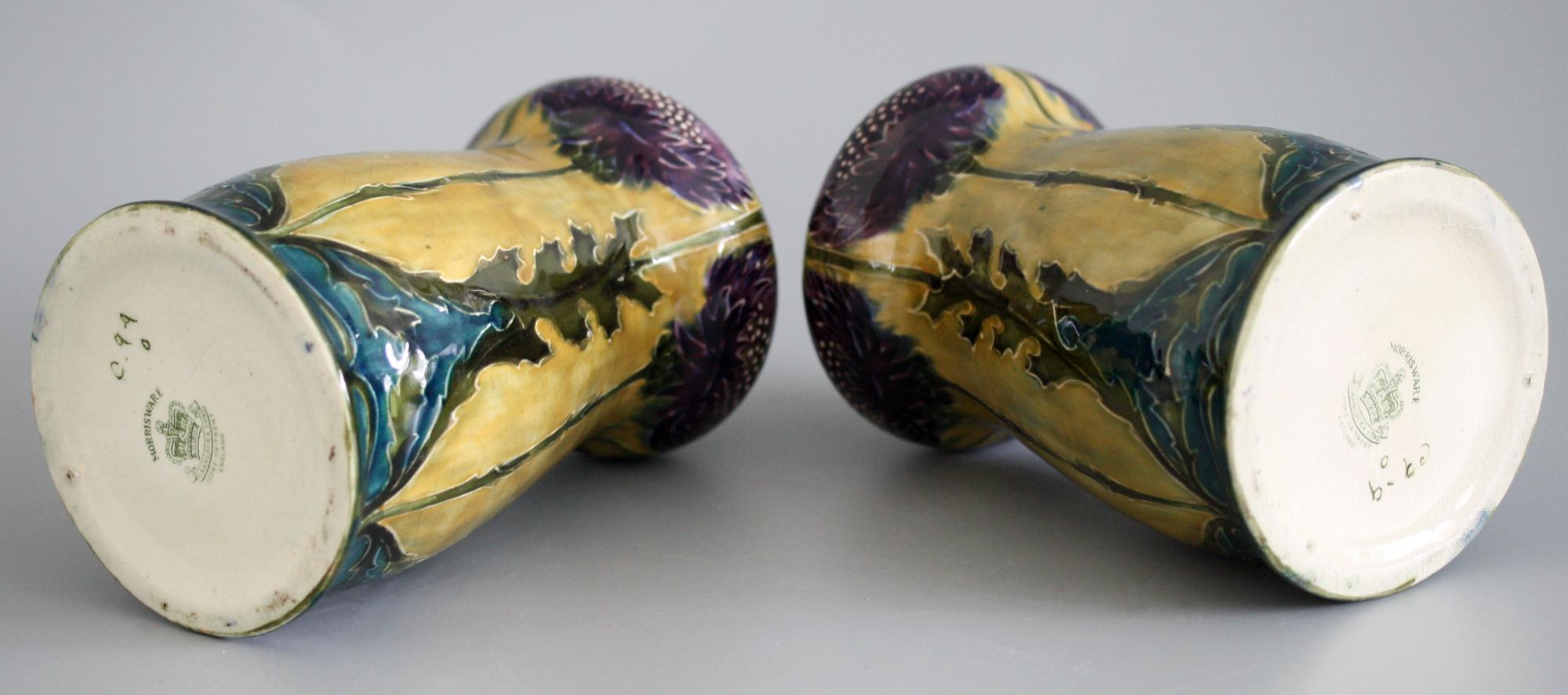 A stunning and rare iconic early Art Deco pair Hancock & Sons Morrisware hand painted art pottery vases with flowering thistles by George Cartlidge dating between 1918 and 1926. These stylish bud shaped vases have a very Art Nouveau appearance and