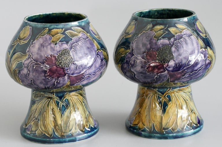 A stunning and rare iconic early pair of Art Deco Hancock & Sons Morrisware hand painted art pottery vases with flowering poppies by George Cartlidge dating between 1918 and 1926. These stylish bud shaped vases are modelled with rounded bud shaped