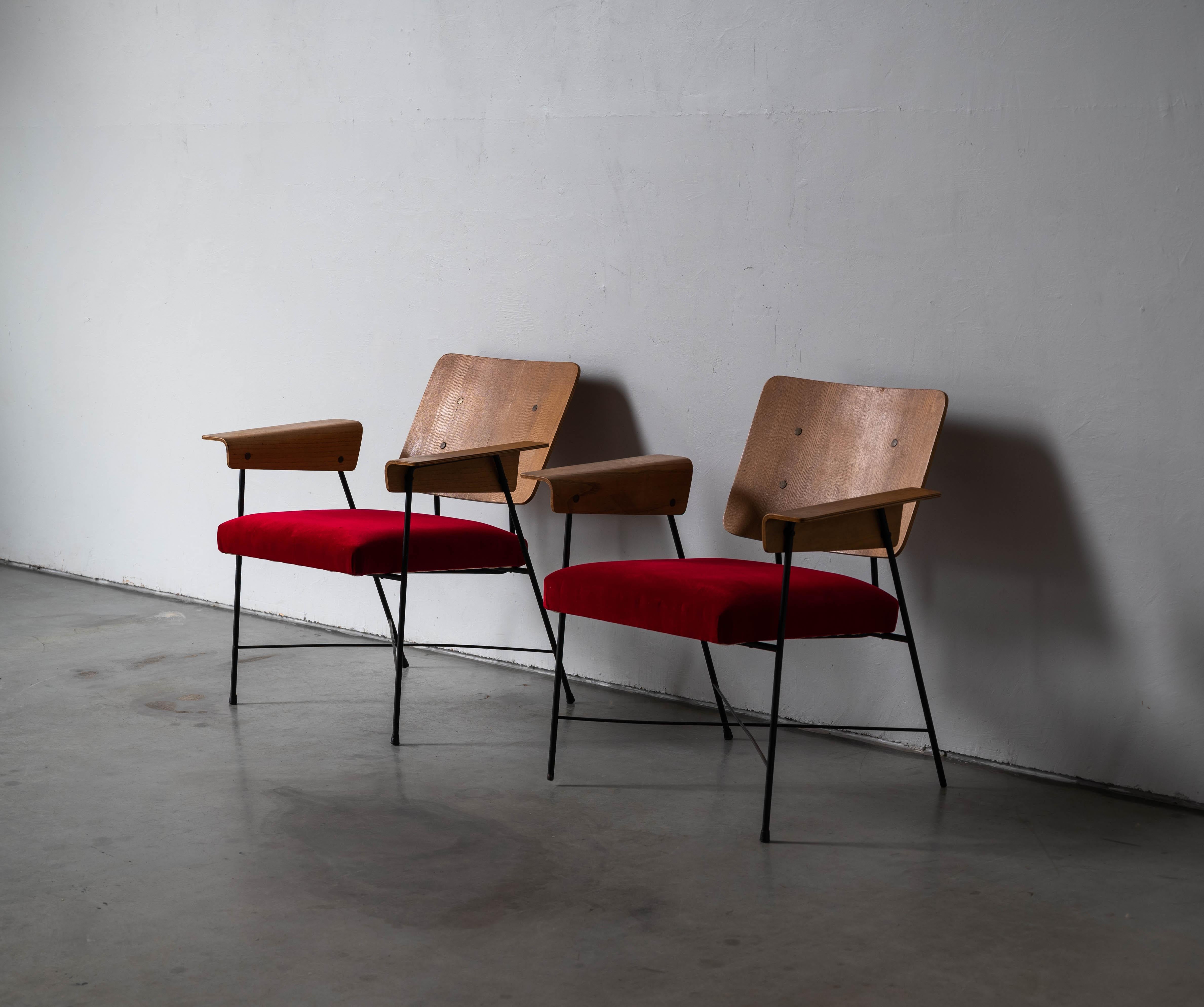 A pair of lounge chairs. Designed by George Coslin Italy, 1960s. Metal frame, plywood, and fabric.