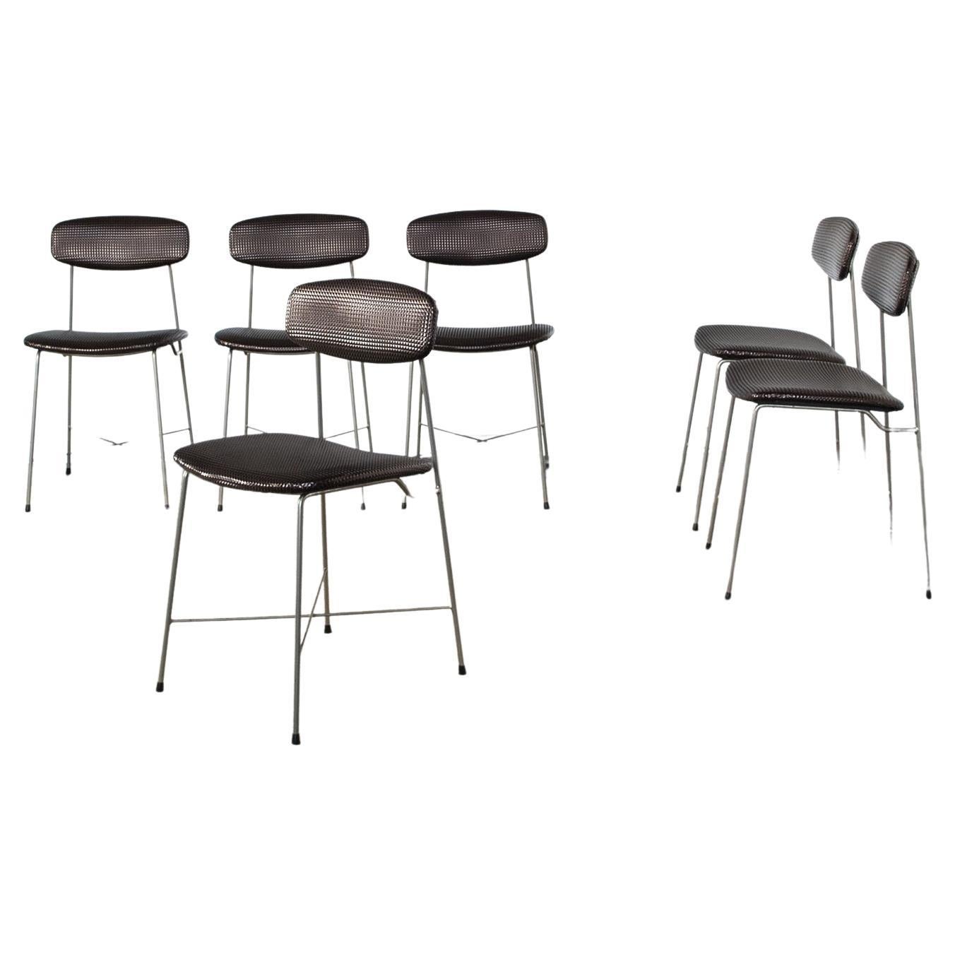 Ensemble de six chaises à structure en fer incurvée assise en tissu synthétique designer George Coslin production Faram années 1960

.