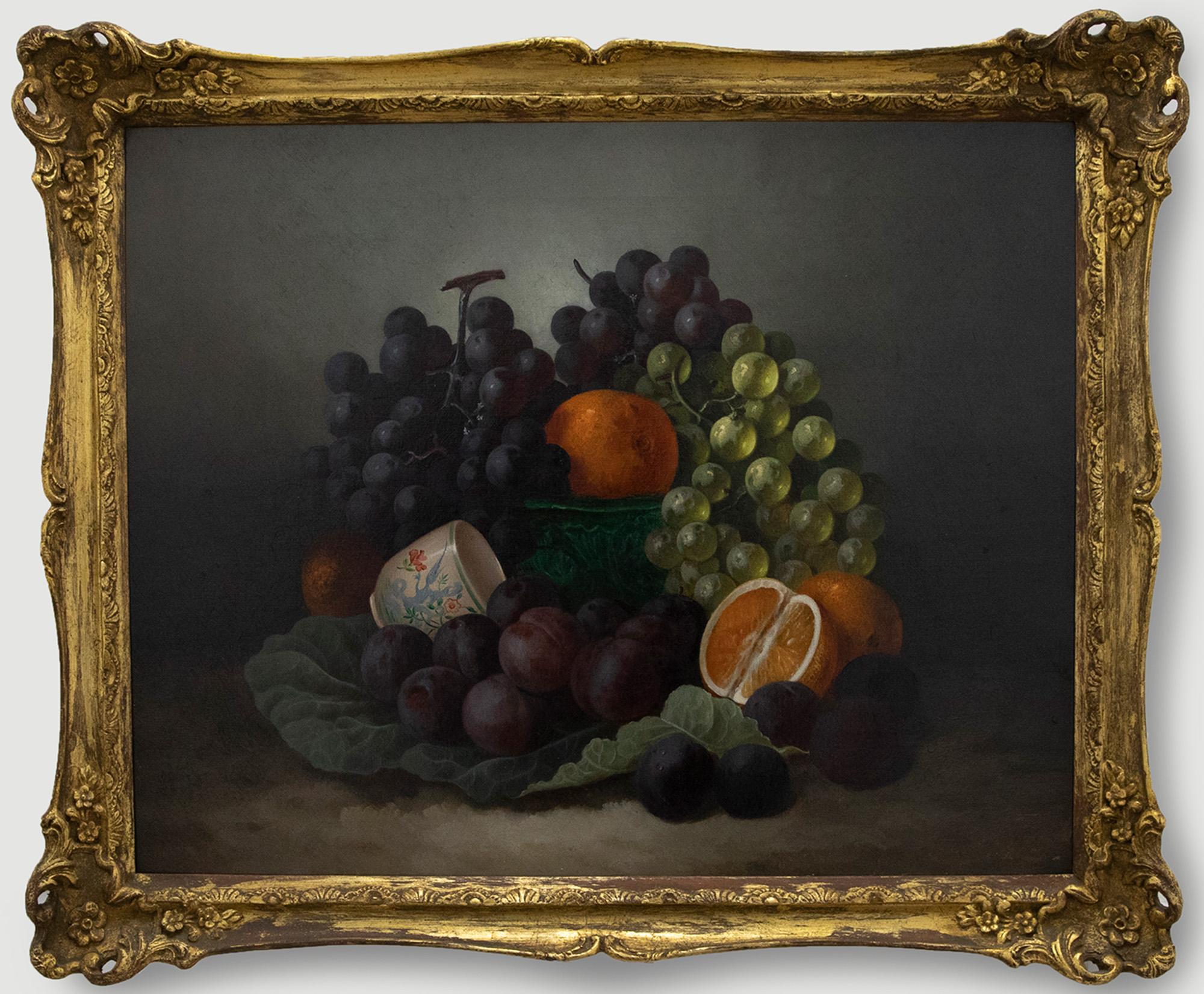 A finely painted oil still life of soft fruits, by the popular British artist George Crisp (1875-1916). The scene depicts a sumptuous display of oranges, plums and grapes, encompassed in a cabbage leaf and Wedgewood bowl. The oil has been signed by