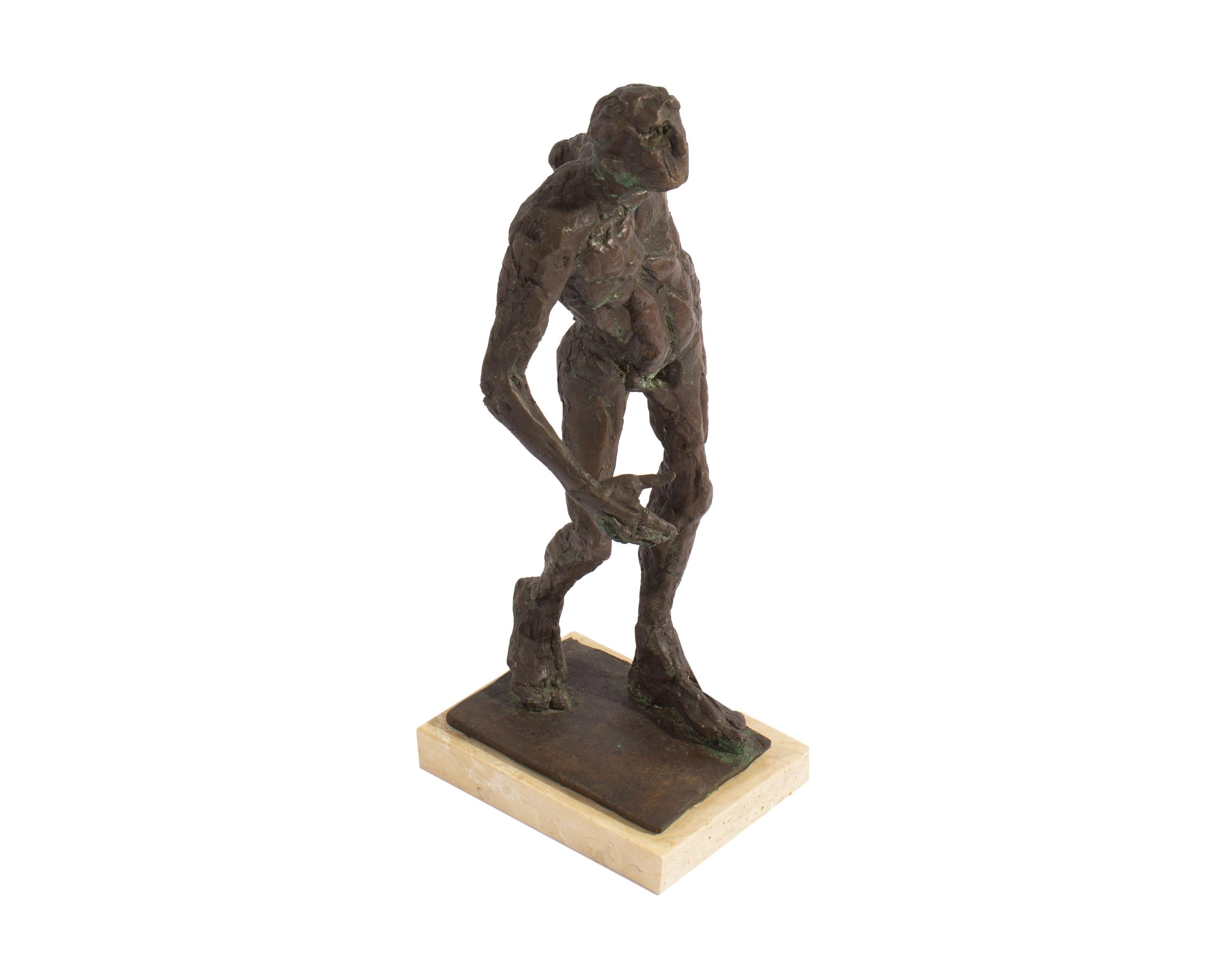 A 1973 abstract bronze sculpture of a man by American artist George De Groat (1917-1995). Signed and dated 