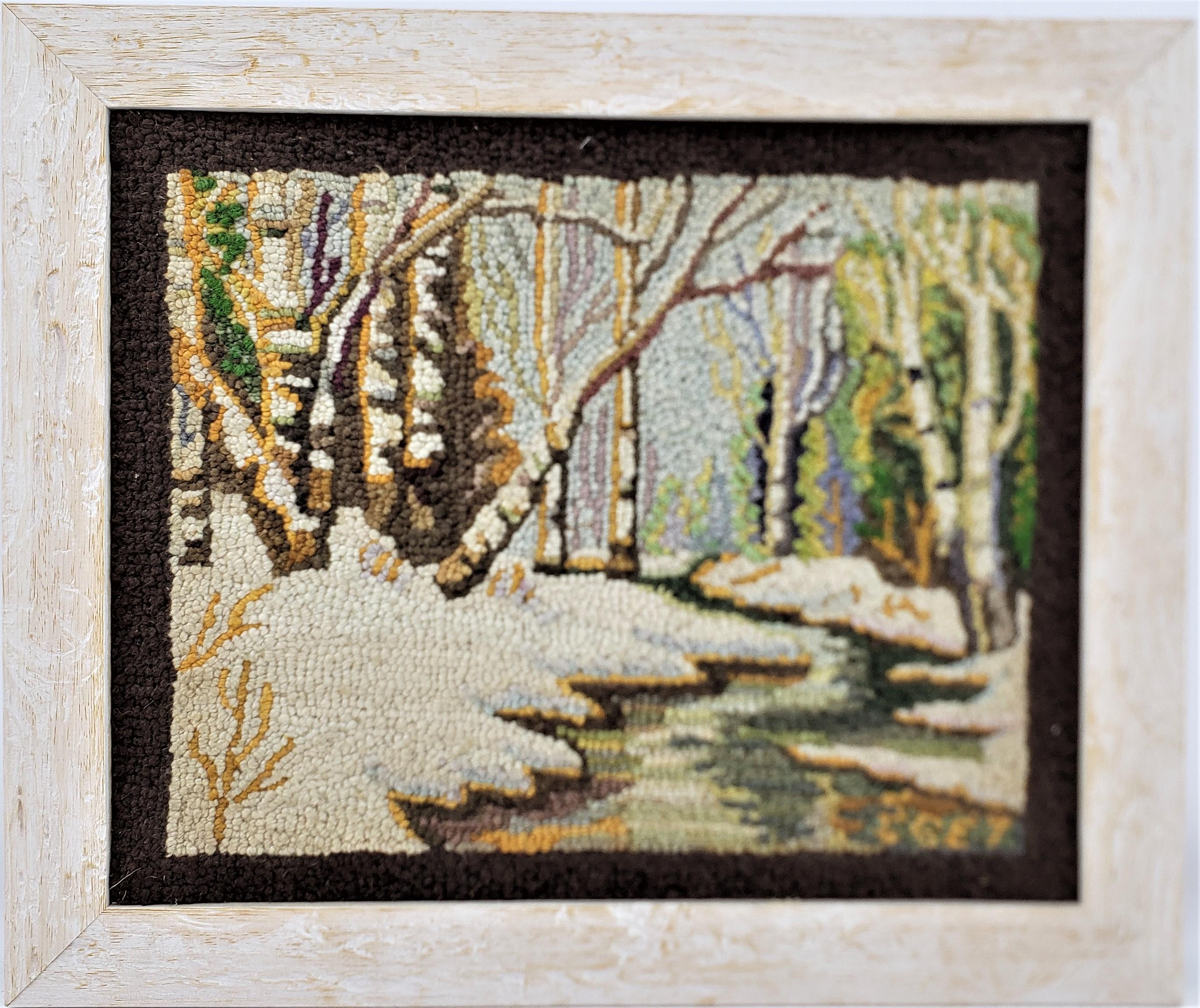 Ce tapis crocheté encadré a été réalisé par le célèbre George Edouard Tremblay du Québec (Canada) vers 1940 dans le style Folk Art de l'époque. Le tapis ou la natte est fait de laine, vraisemblablement sur de la toile de jute et encadré dans un
