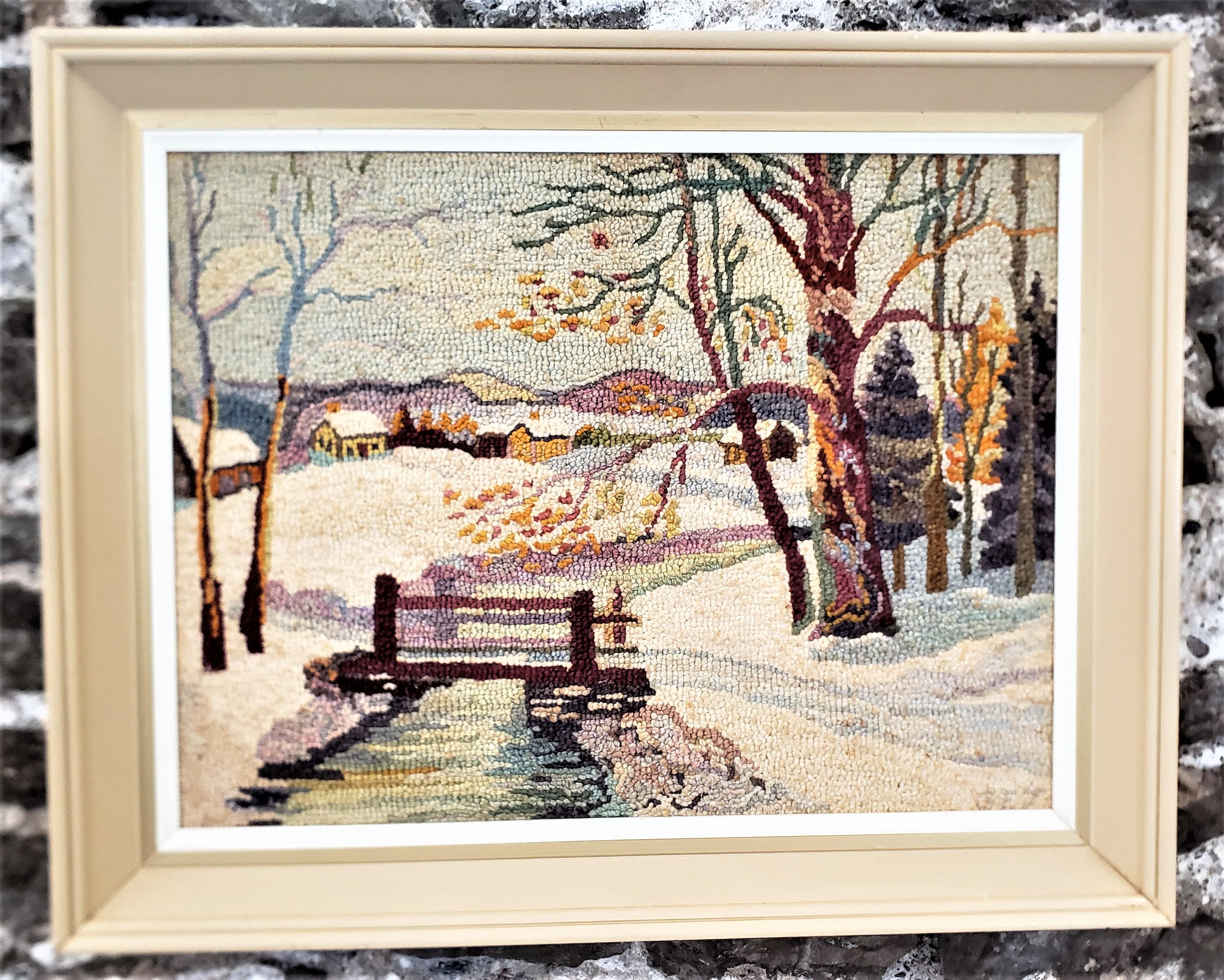 This framed hooked rug or mat was done by the well known George Edouard Tremblay of Quebec Canada in approximately 1940 in his period Folk Art style. The rug or mat is done with wool on burlap which has been mounted on masonite board and framed in a