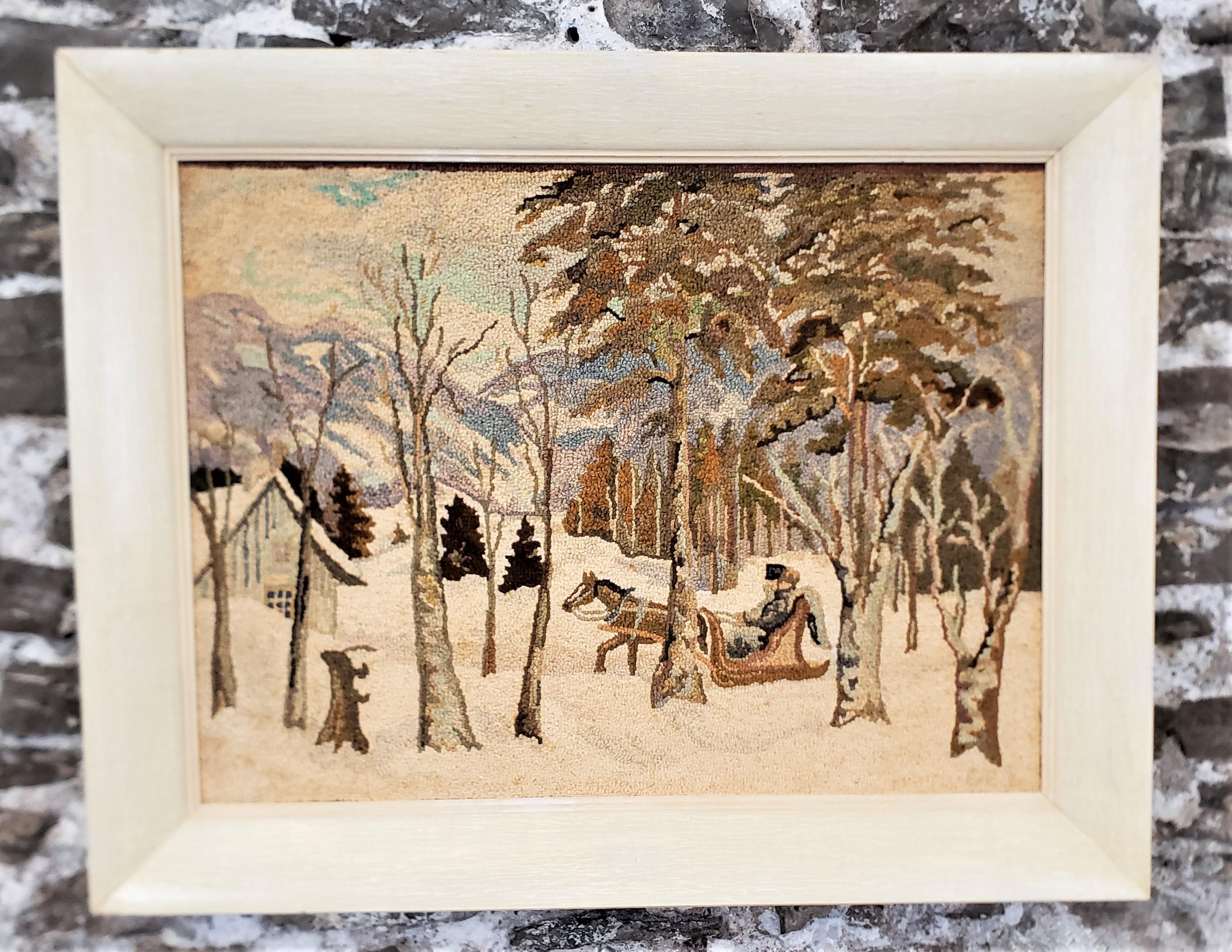 This framed hooked rug or mat was done by the well known George Edouard Tremblay of Quebec Canada in approximately 1940 in his period Folk Art style. The rug or mat is done with wool on burlap which has been mounted on masonite board and framed in a