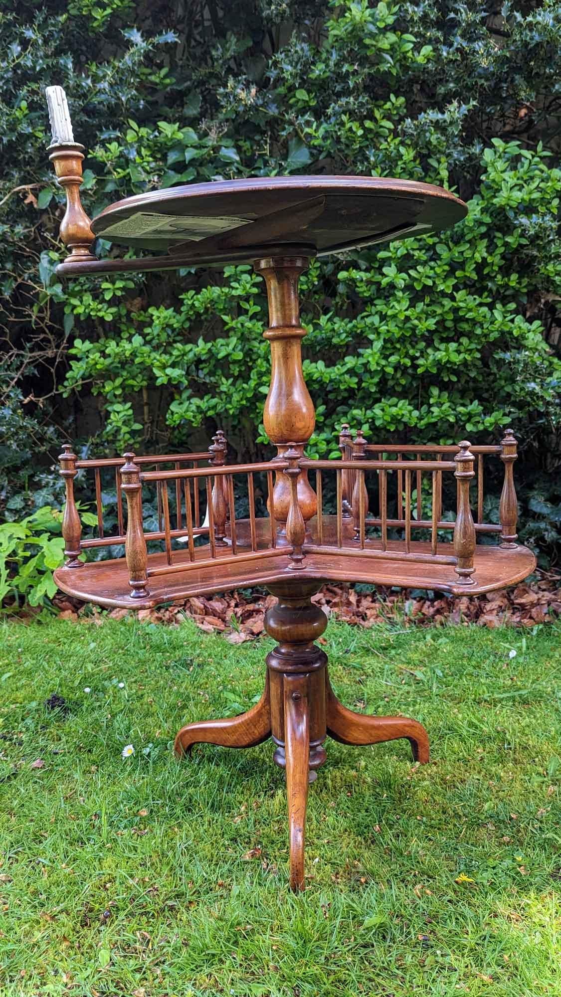 This table was made in the mid-Victorian period — possibly about 1860. It measures 18 inches diameter across the top and the gallery tray has a slightly wider dimension of 24 inches. The table is 31 inches high and 14 inches to the middle