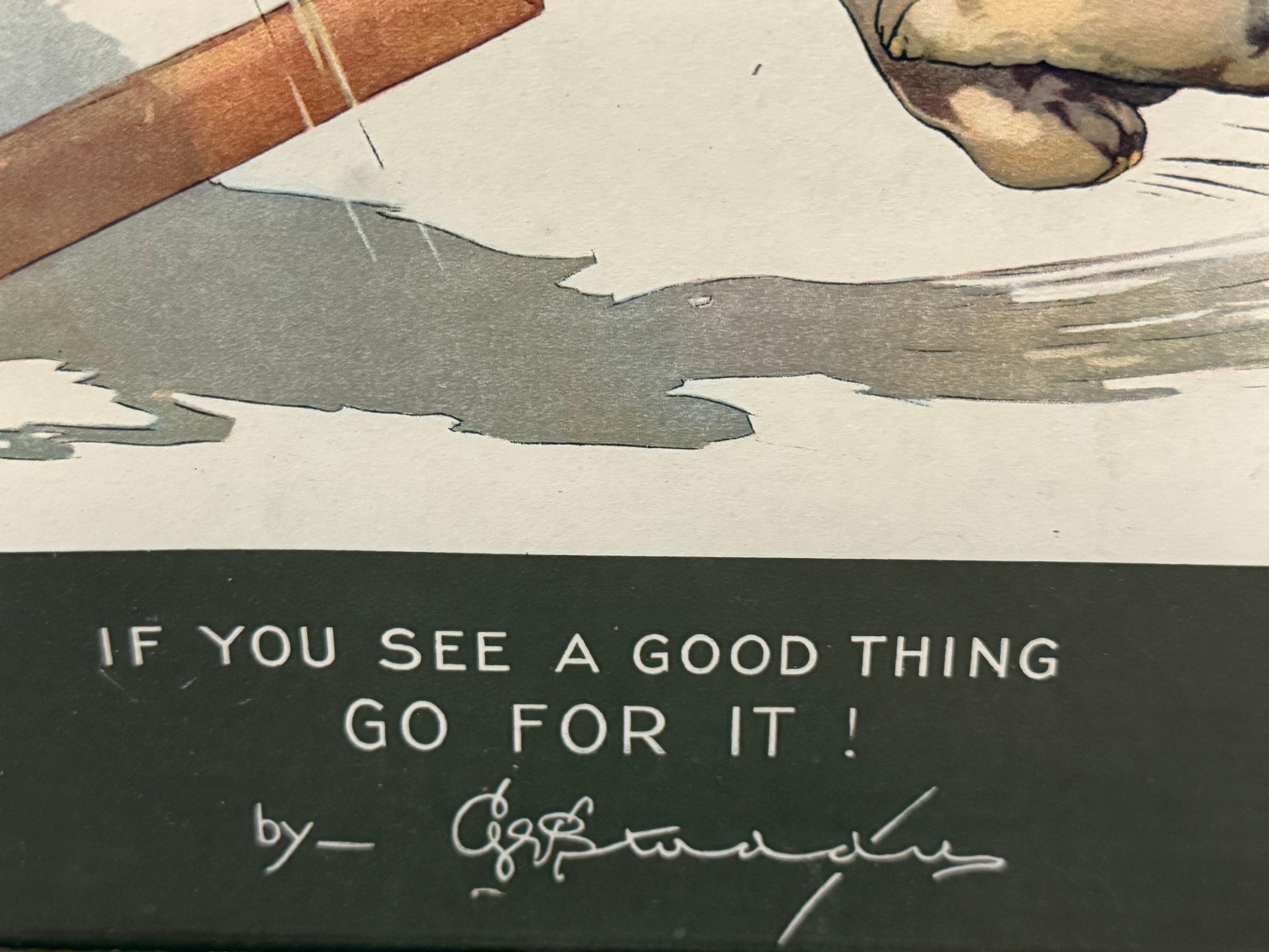 A whimsical vintage print by George Ernest Studdy, featuring a lively puppy lunging eagerly at its reflection in a mirror. Paired with the humorous caption, “If you see a good thing, go for it!”, the illustration captures Studdy’s trademark blend of