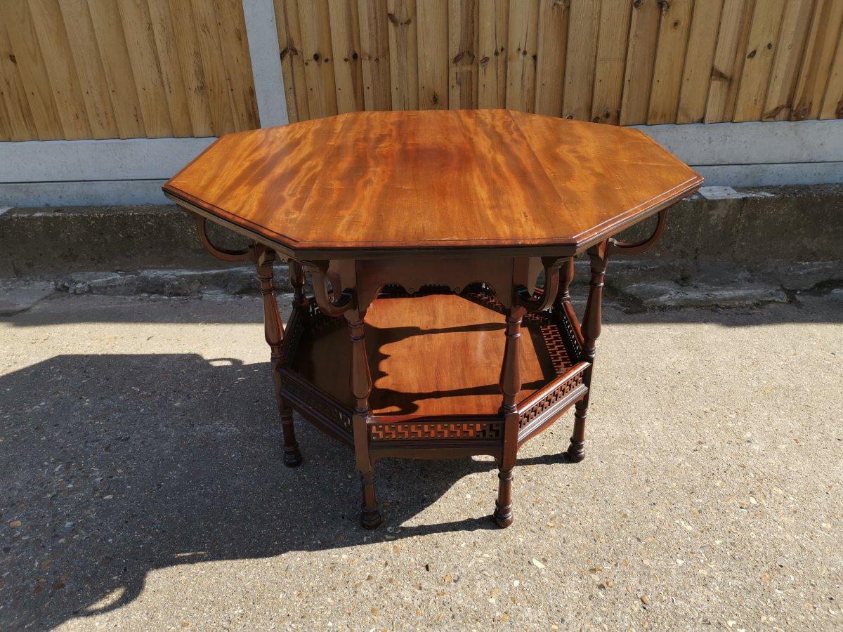 George Faulkner Armitage. An Aesthetic Movement Octagonal Mahogany Center Table In Good Condition For Sale In London, GB