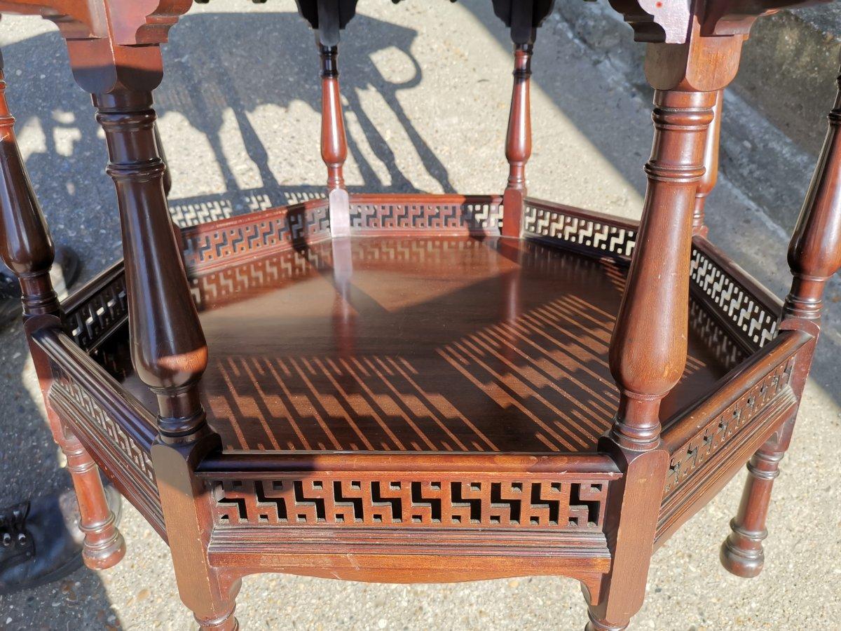 George Faulkner Armitage. An Aesthetic Movement Octagonal Mahogany Center Table For Sale 1