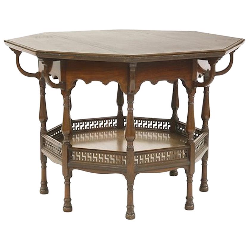 George Faulkner Armitage. An Aesthetic Movement Octagonal Mahogany Center Table