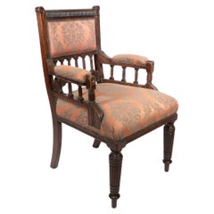 Antique George Faulkner Armitage (attributed). An Aesthetic Movement mahogany armchair