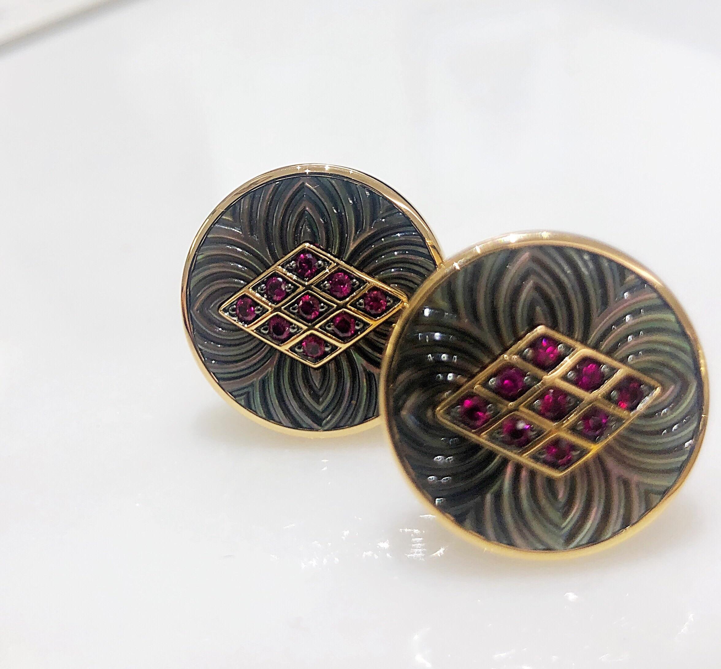 Created by George Gero, Renowned worldwide for luxurious men's cuff-links, comes these classic round cuff links which are set in 18 karat rose gold . Nine round brilliant cut Rubies are set in a diamond shape mounted on top of hand carved Black