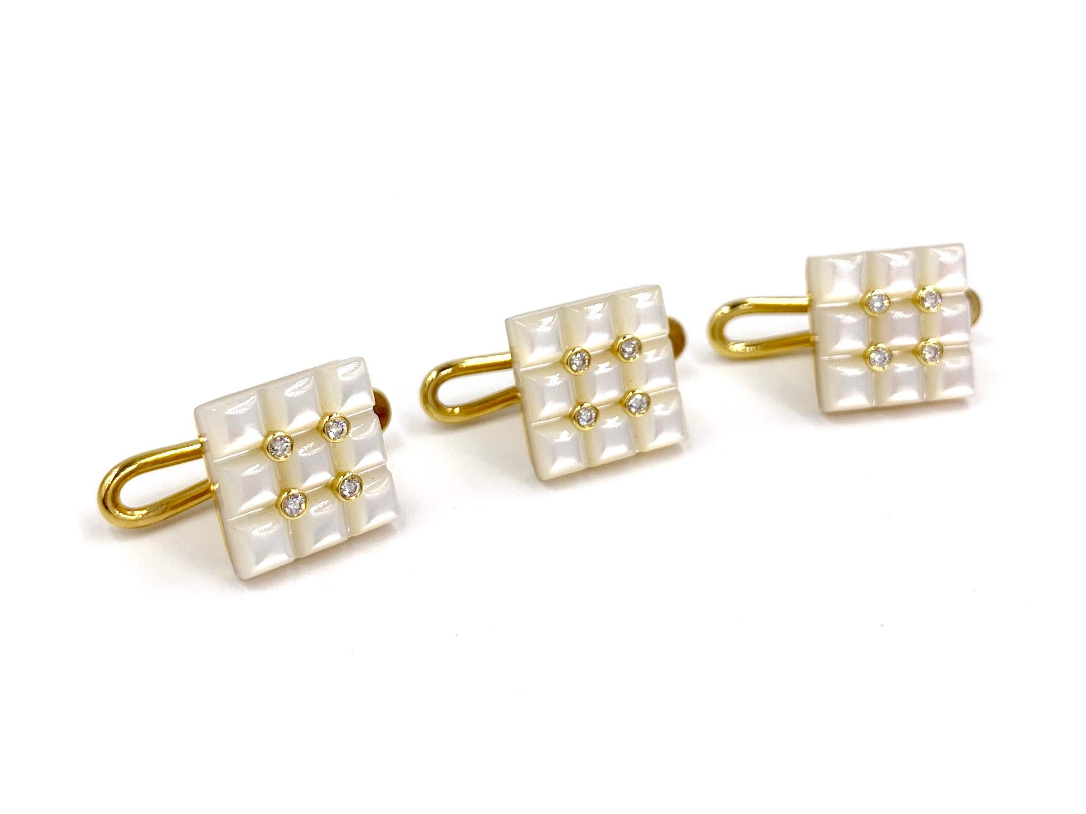 Set of 3 18 karat yellow gold elegantly designed square shirt studs by George Gero. Each stud features a carved lustrous mother of pearl adorned with four bezel set round diamonds. Diamond total weight is .09 carats at approximately F color, VS2