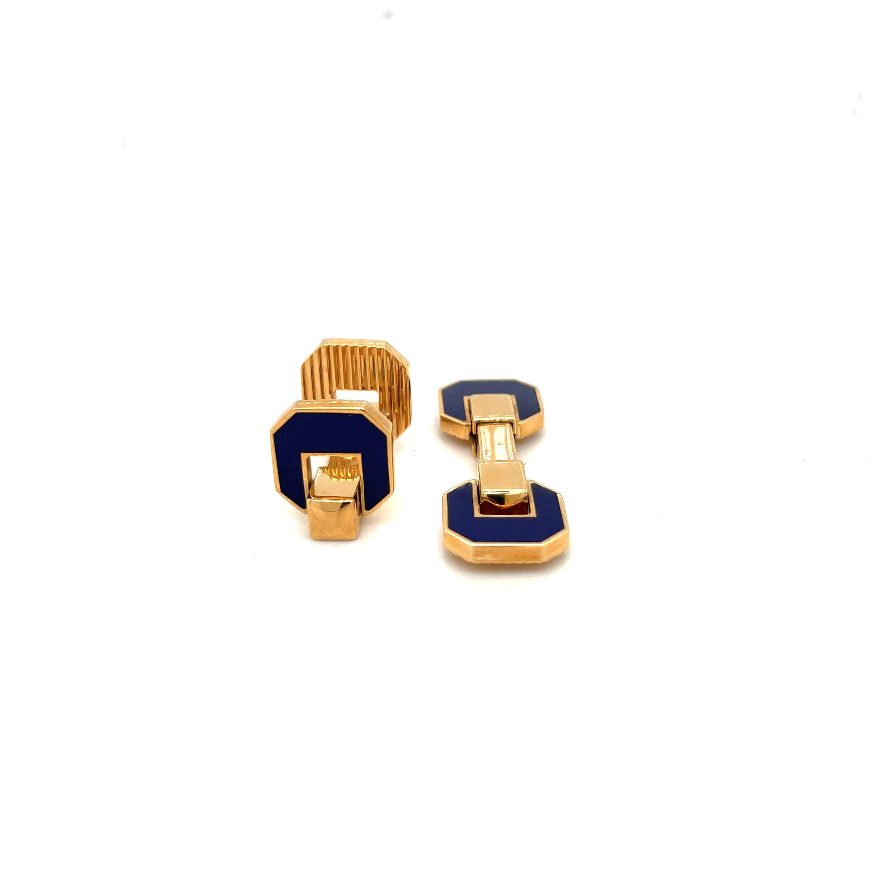 Created by George Gero, renowned worldwide for luxurious men's cuff-links, comes this classic pair in 18 karat yellow gold. The geometric cuff links are the bar style. Each end is set with blue enamel on one side, and yellow gold on the other. They