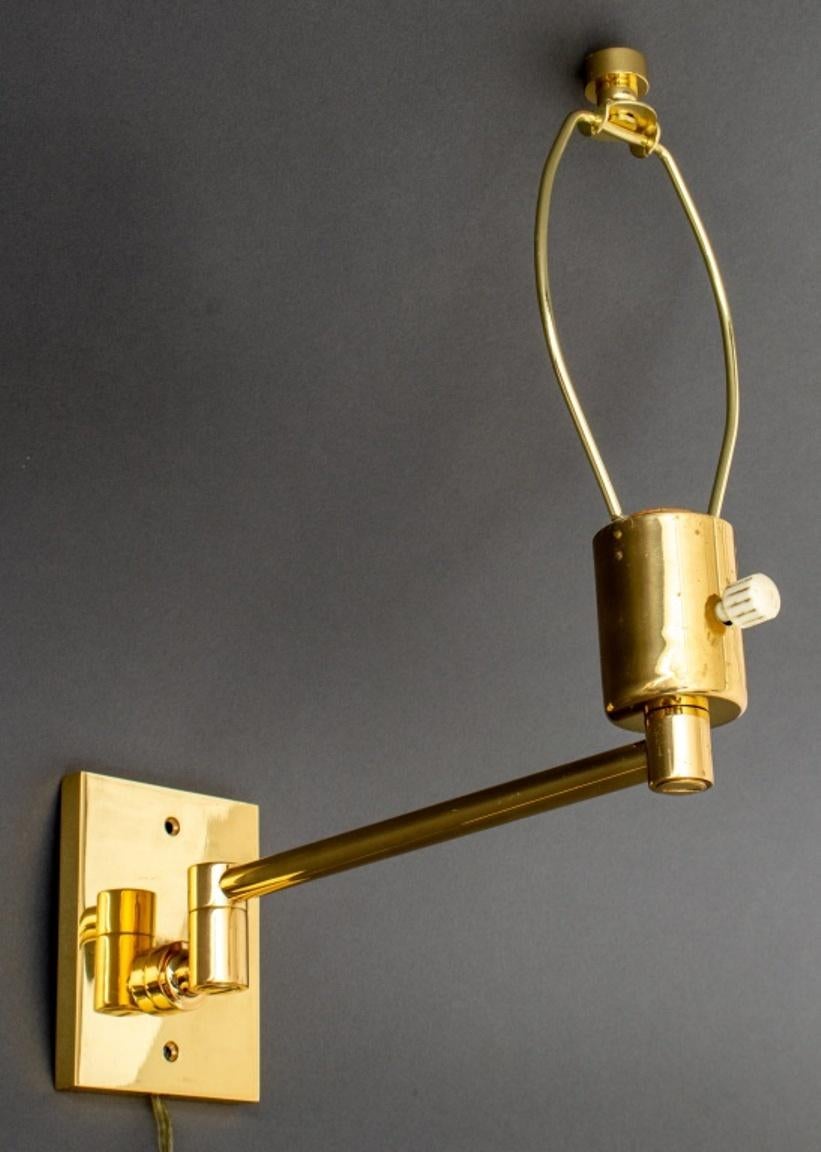 George Hansen (American, XX) for Hinson Lamps, pair of brass swing arm wall-mounted lamps, likely 1980s-1990s, the interior of the back plate with cast signature 