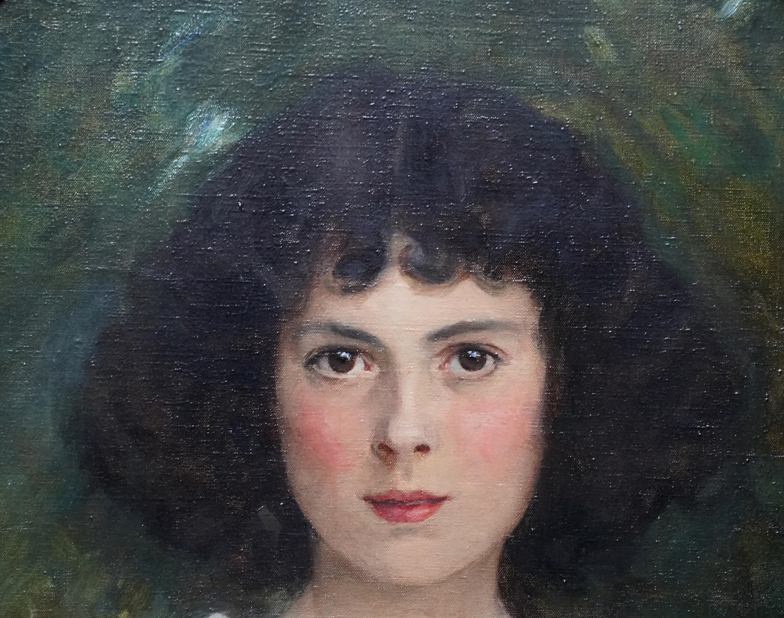 Dieses schöne schottische Ölgemälde mit ovalem Porträt aus der Edwardianischen Zeit stammt von dem bekannten Künstler George Harcourt. Es wurde um 1910 gemalt und zeigt ein stehendes Dreiviertelporträt eines jungen Mädchens, das nach vorne blickt