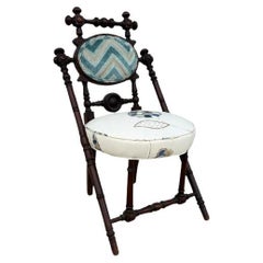 Antique George Hunziger patent 1869 walnut chair with newer crewel upholstery