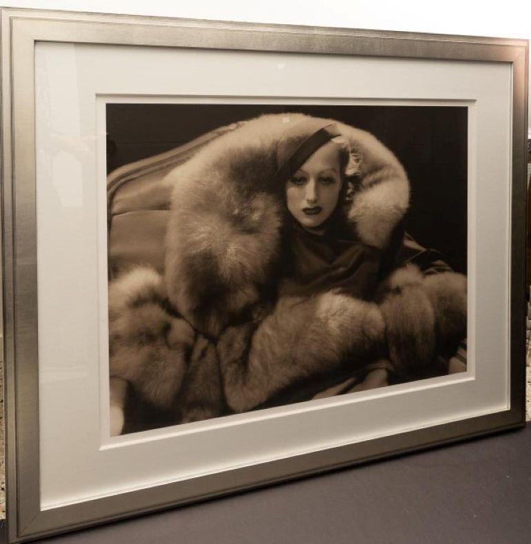 This large scale photograph of the iconic, Hollywood movie star Joan Crawford was originally taken in 1933 by George Hurrell. The photo was for the on-screen role that Crawford played as Letty Lynton.

The original photo was taken in 1933 and this