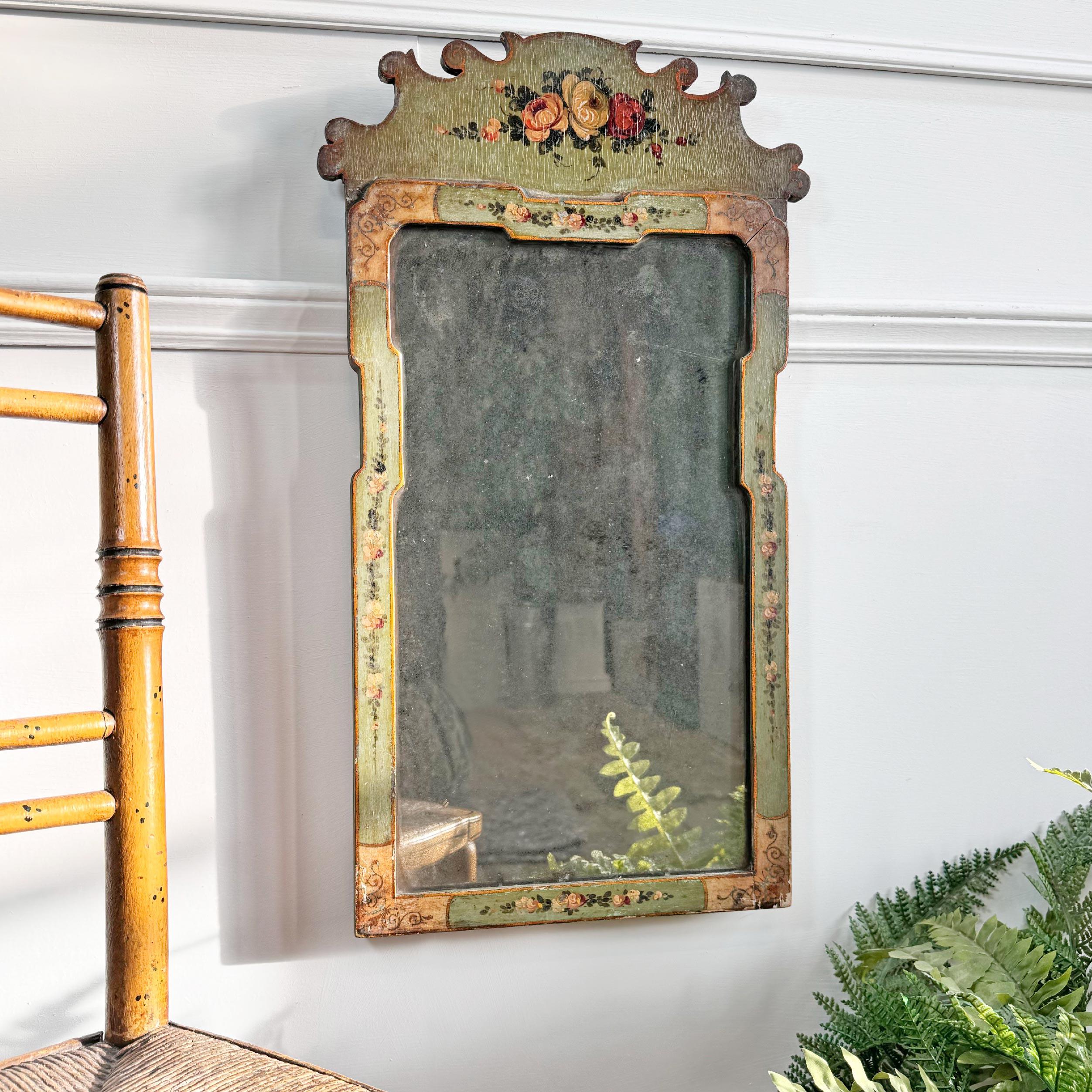 A very pretty and rare painted Georgian wall mirror, circa 1720, with the original foxed mercury plate. Decorated with floral motif and scrolls, edged in gilt.



Backboards are original.



Height 58cm, Width 32.5cm, Depth 2.5cm

Mercury Mirror