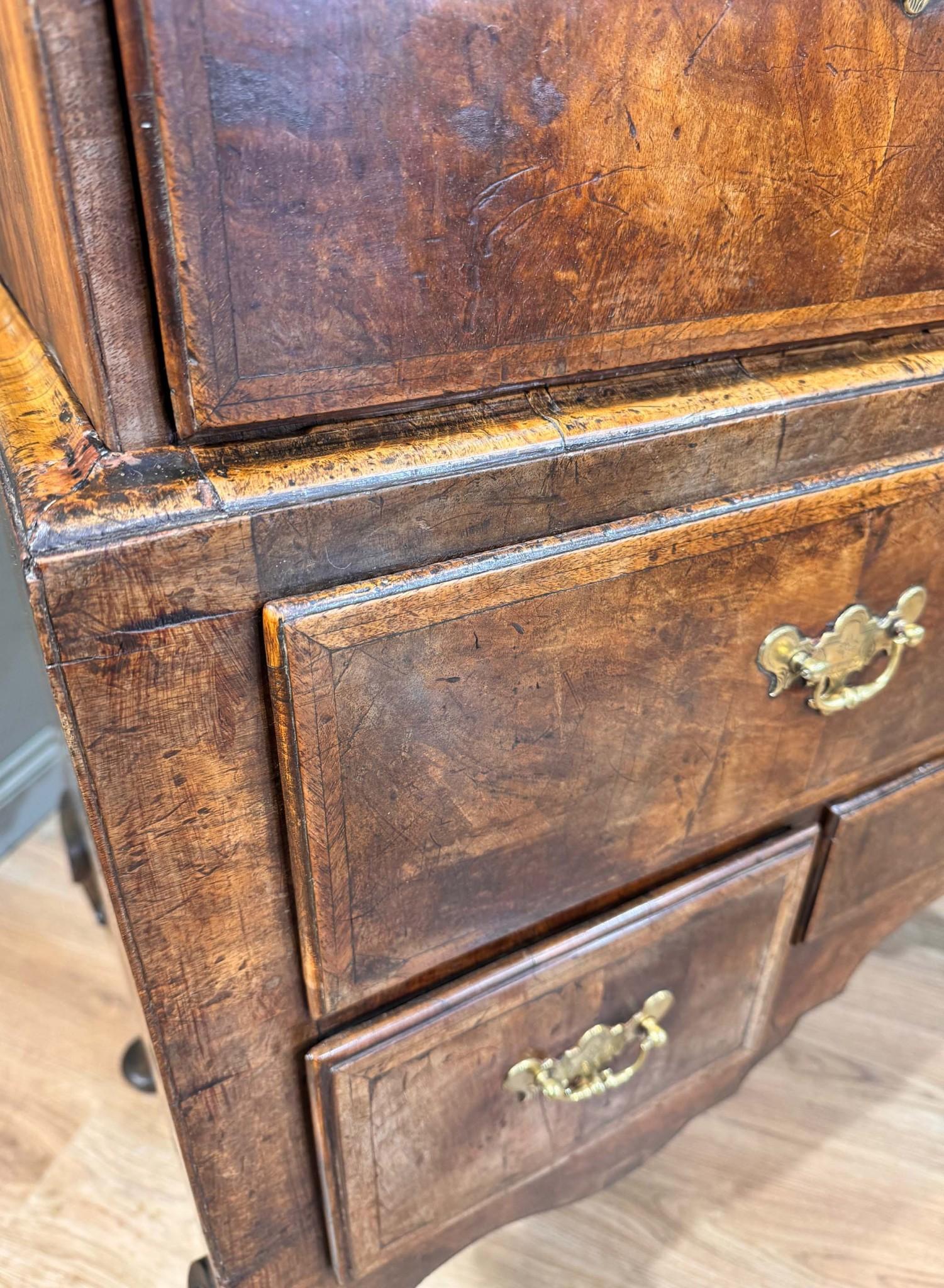 You are viewing a sumptuous Georgian period walnut highboy chest of drawers
Such a classic piece of English antique furniture with nine drawers so ample storage
Love the oyster walnut patina, so deep and rich
Features some classic Queen Anne