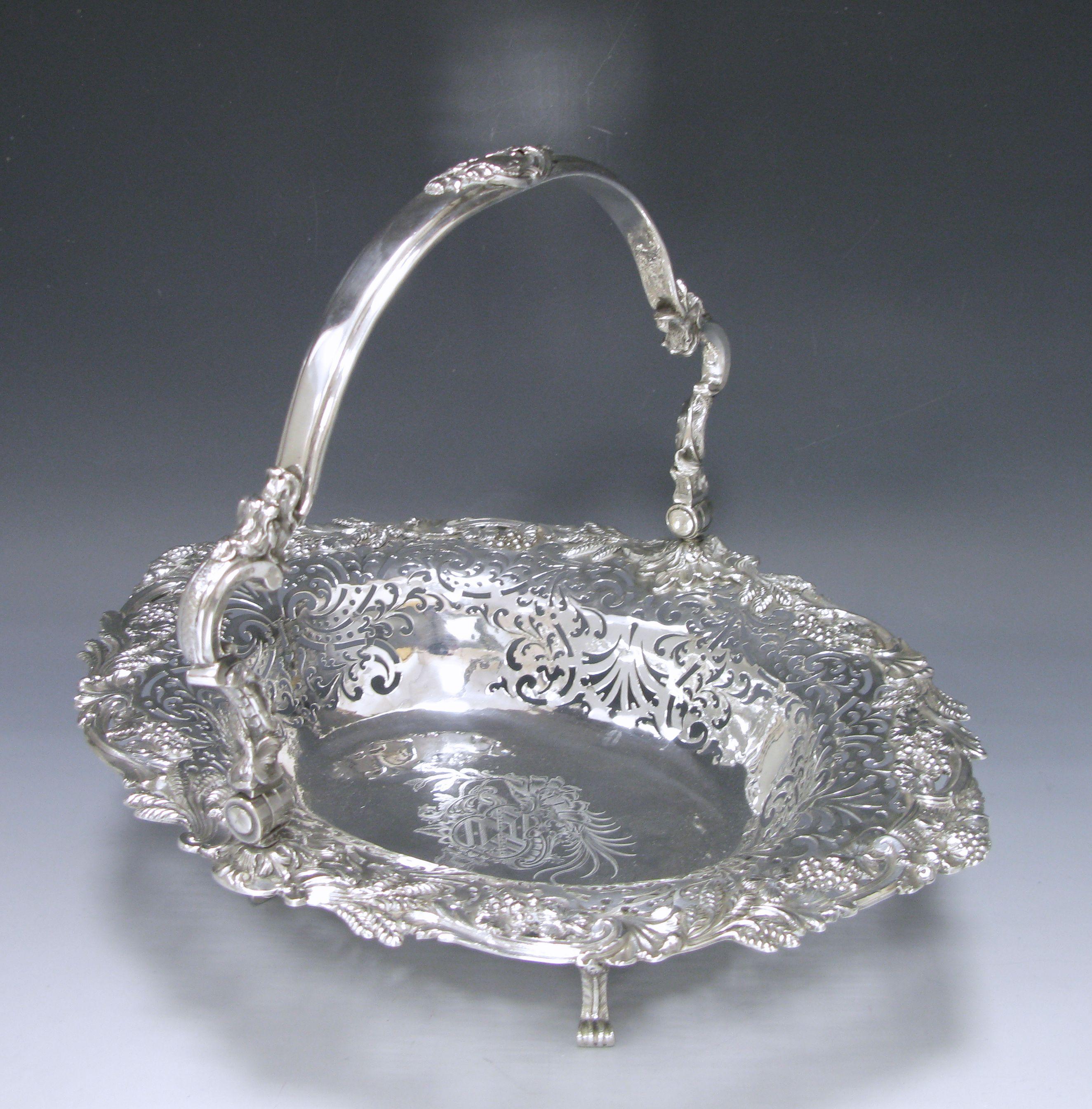 A George II antique silver basket that was traditionally used for cakes but also could be used for fruit or bread. The basket is of shaped oval outline with applied and cast border of wheat-sheaves, acanthus leaves, fruiting vine tendrils and basket