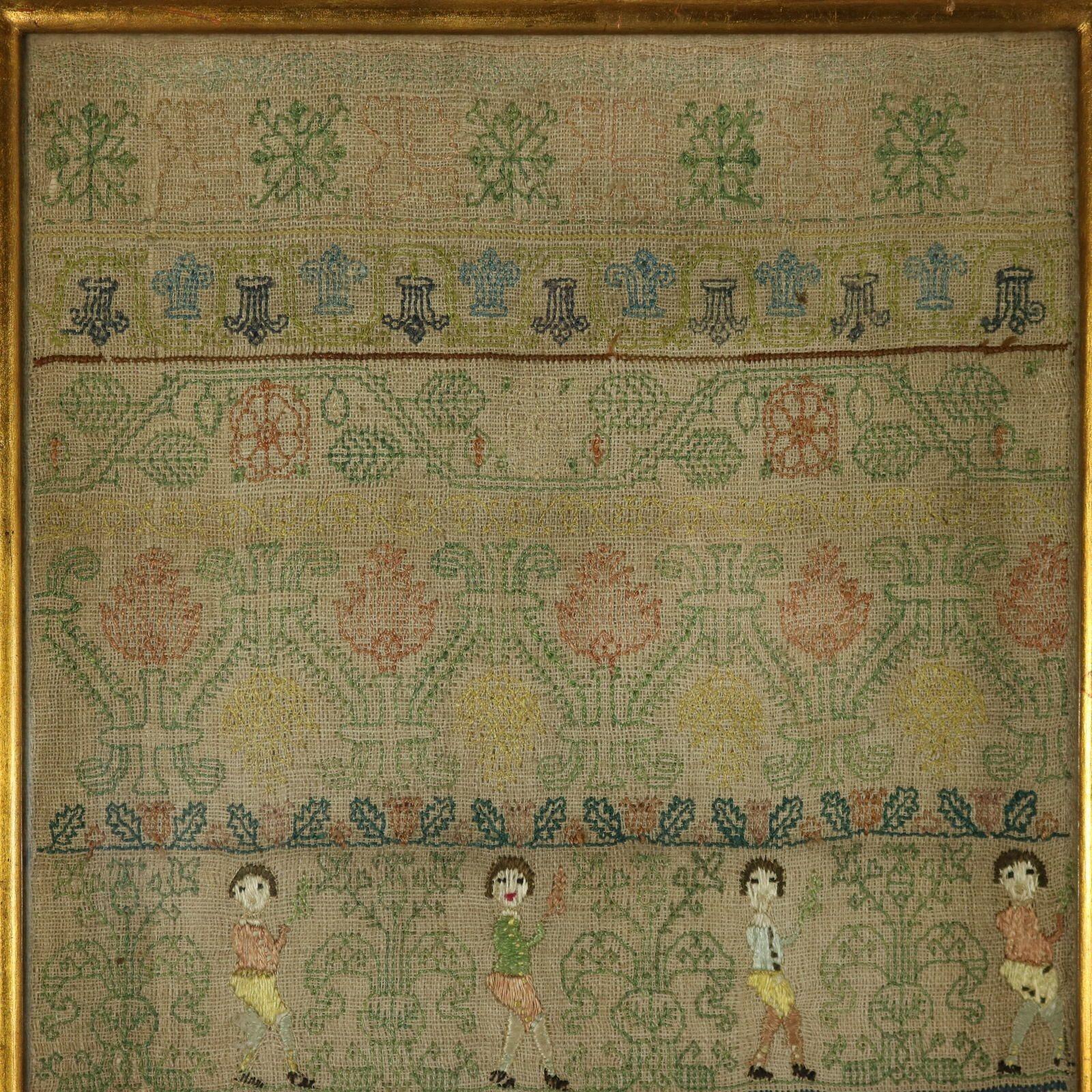 1741 Georgian Band Sampler by Martha Hayter. The sampler is worked in silk on canvas ground, in a variety of stitches. Geometric bands in various patterns. Colours green, blue, yellow, silver, brown and black. Family initials, 'IH, MH, EH, EC, GB,